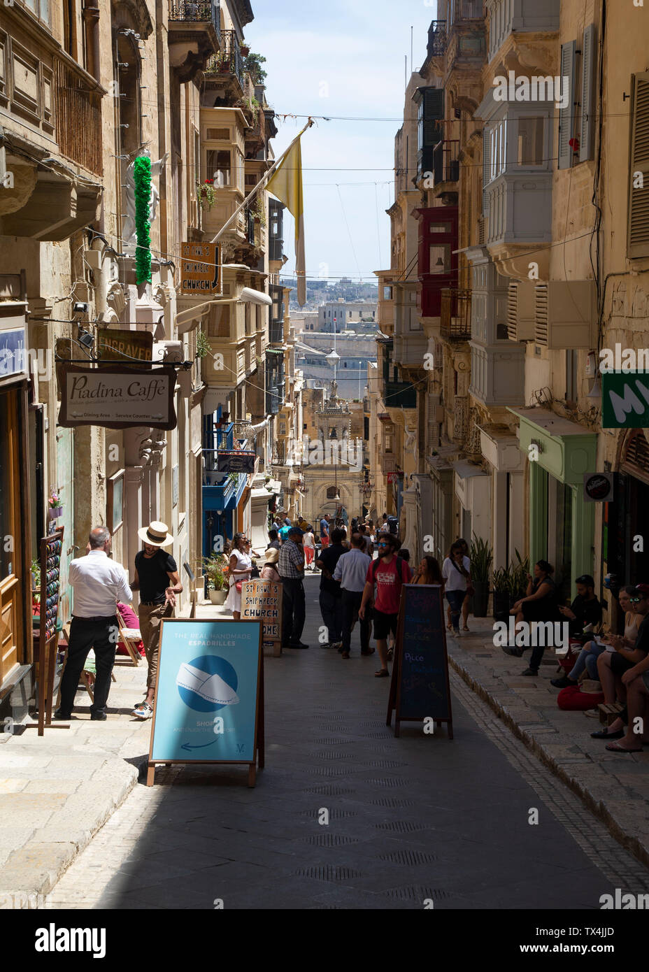 St Lucia Street, one of the busy shopping roads of Valletta Stock Photo