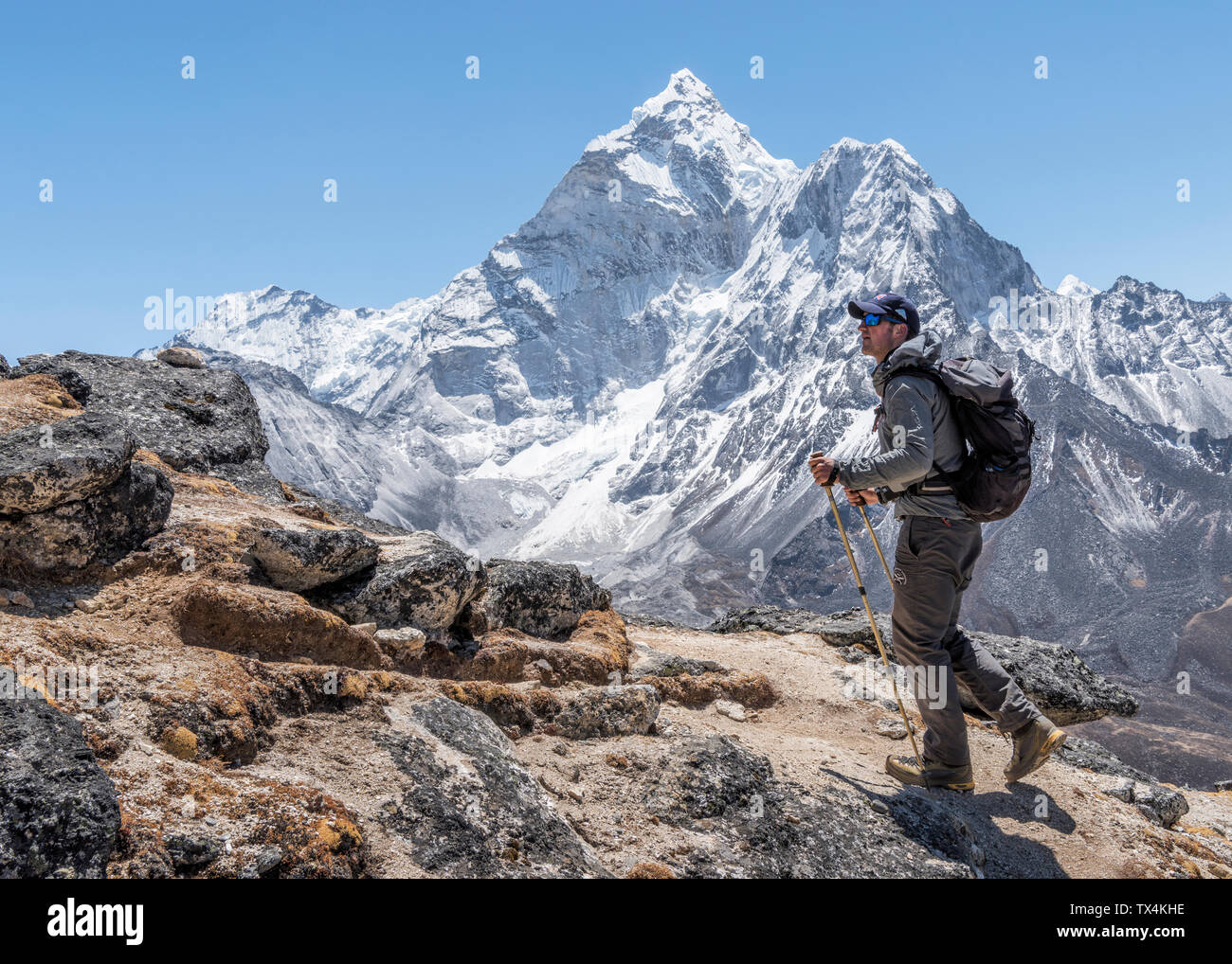 Nepal, Solo Khumbu, Everest, Mountaineer walking at Dingboche Stock