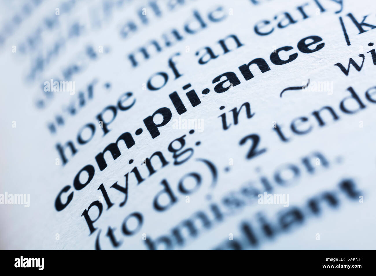 Keyword in a dictionary, compliance Stock Photo