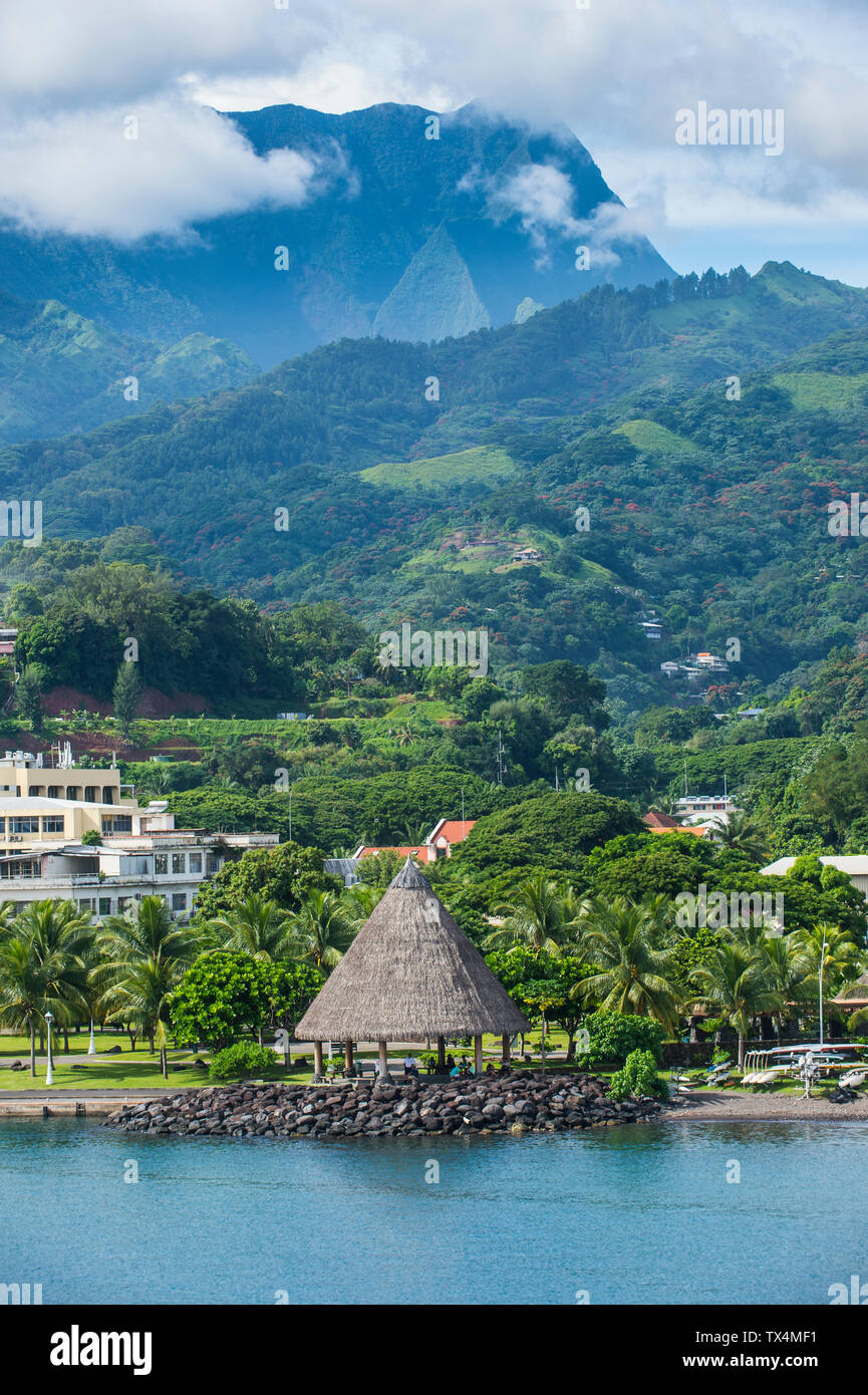 French Polynesia, Tahiti, dramatic mountains looming behind Papeete Stock Photo