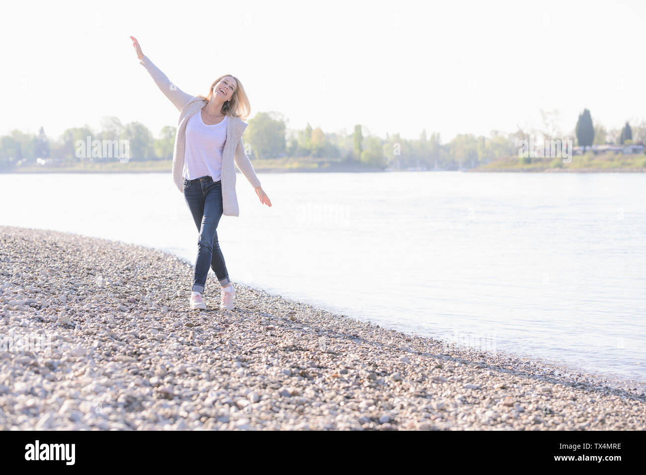 Woman carefree mature hi-res stock photography and images - Alamy