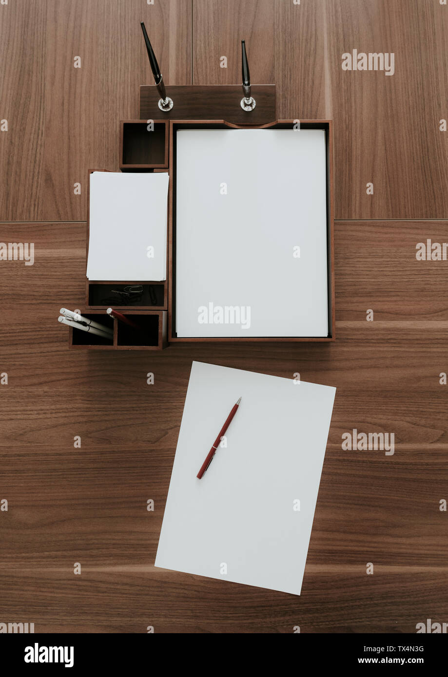 Top view of neat wooden desk in office Stock Photo