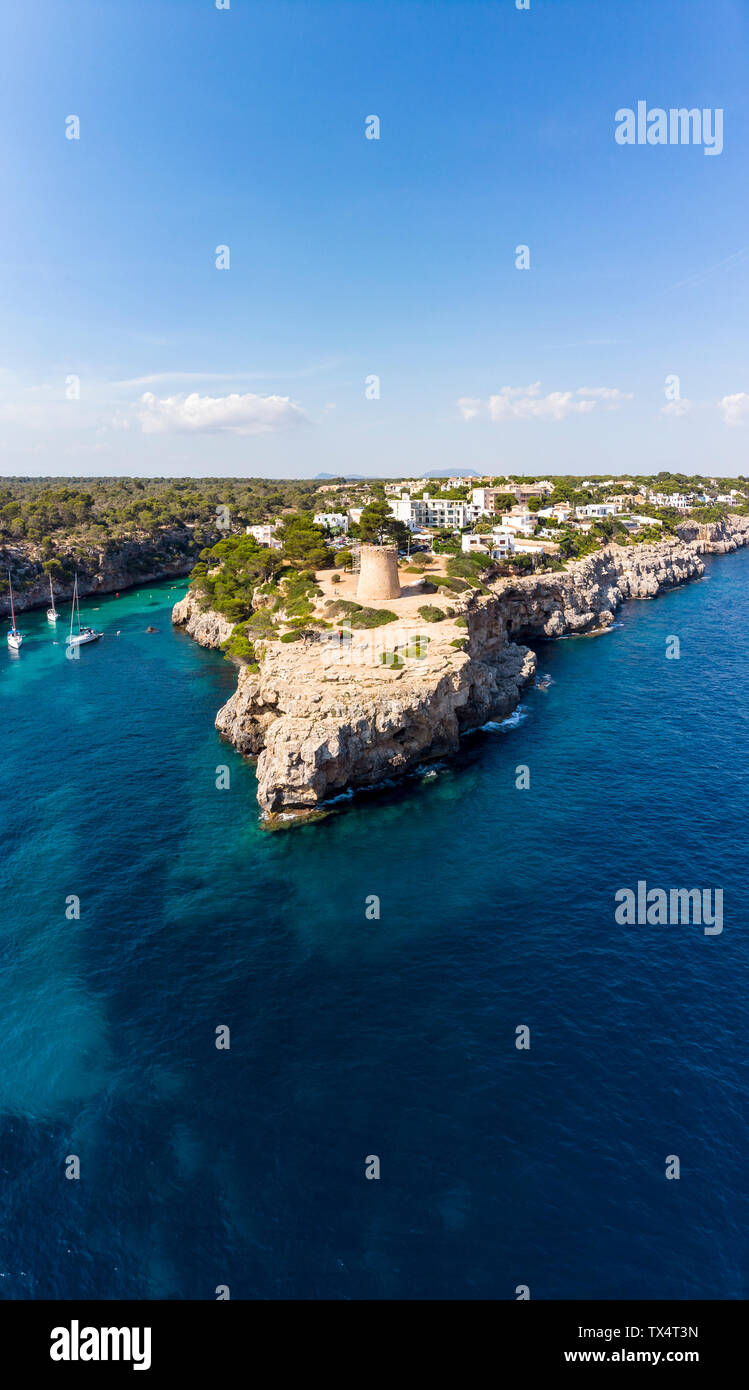 Spain, Balearic Islands, Mallorca, Llucmajor, Aerial view of bay of Cala Pi and Torre de Cala Pi Stock Photo