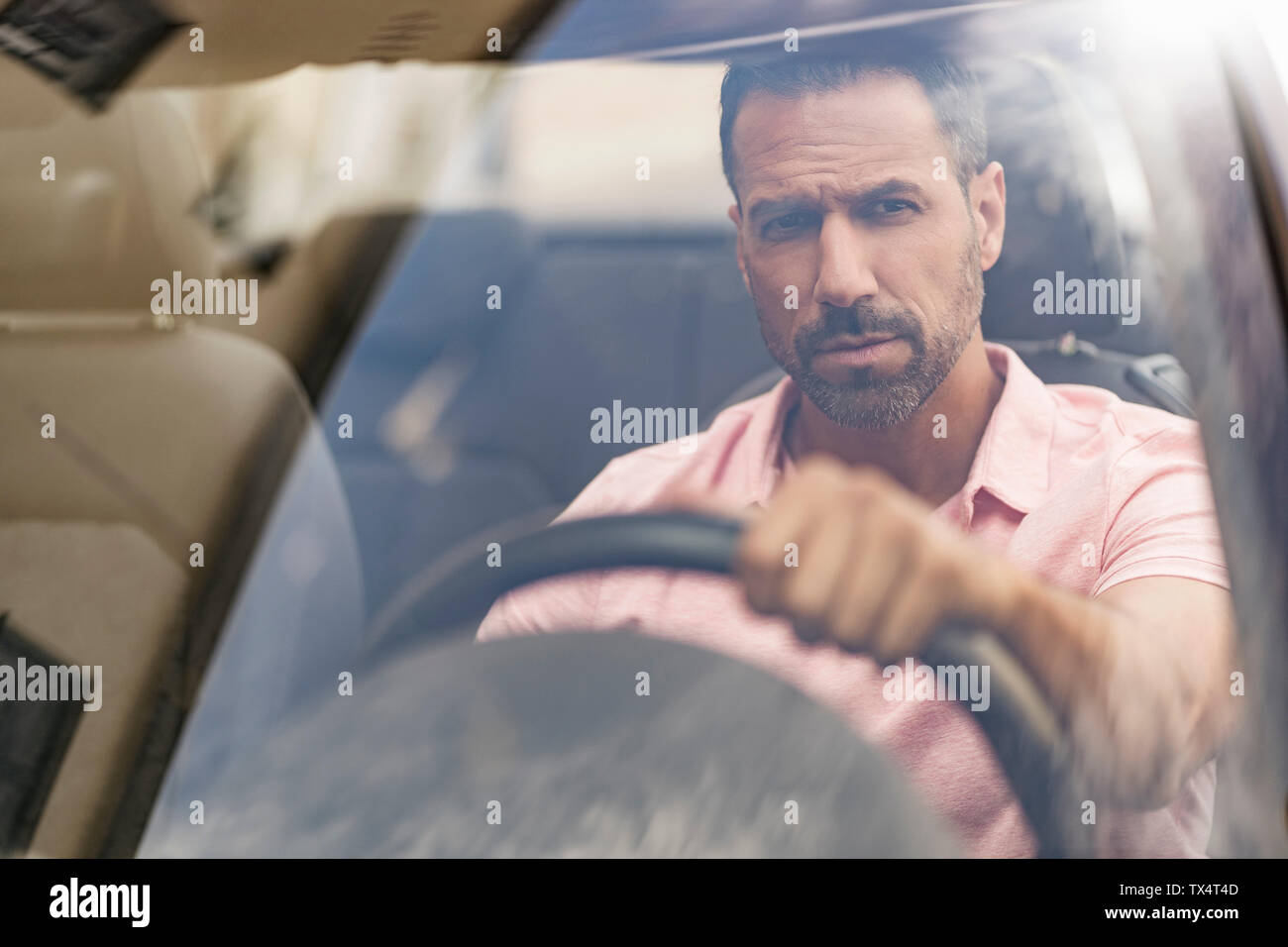 Portrait Of Serious Man Driving Car Stock Photo Alamy