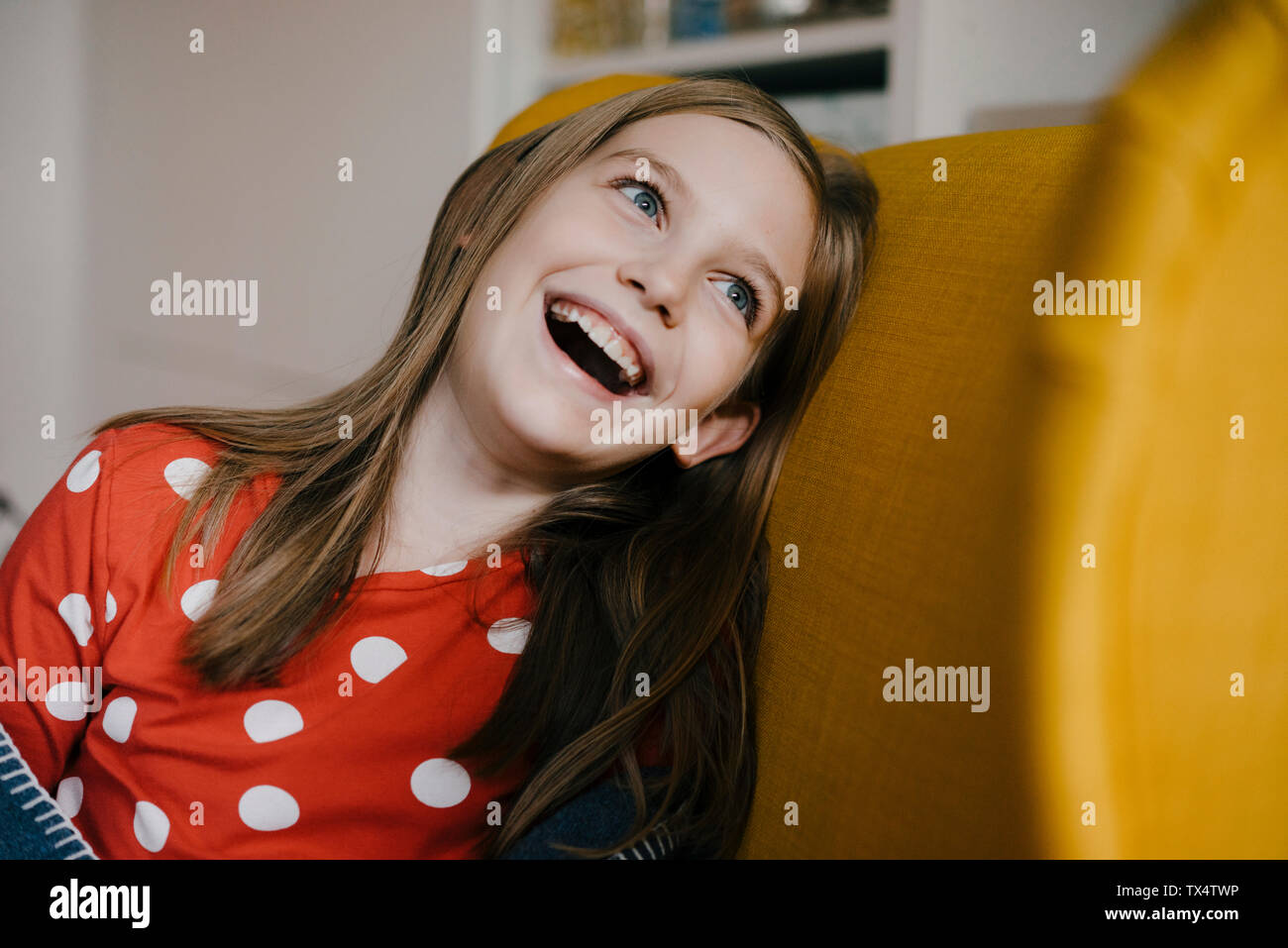 Girl 8 9 laughing hi-res stock photography and images - Alamy