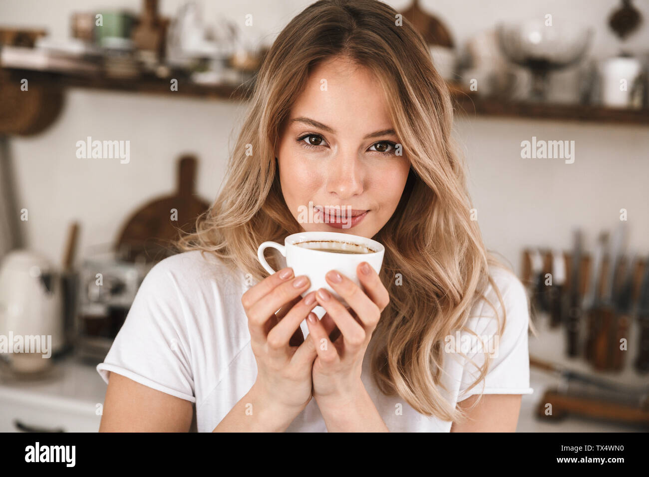 Image Closeup Of Beautiful Blond Woman 20s Wearing White T Shirt