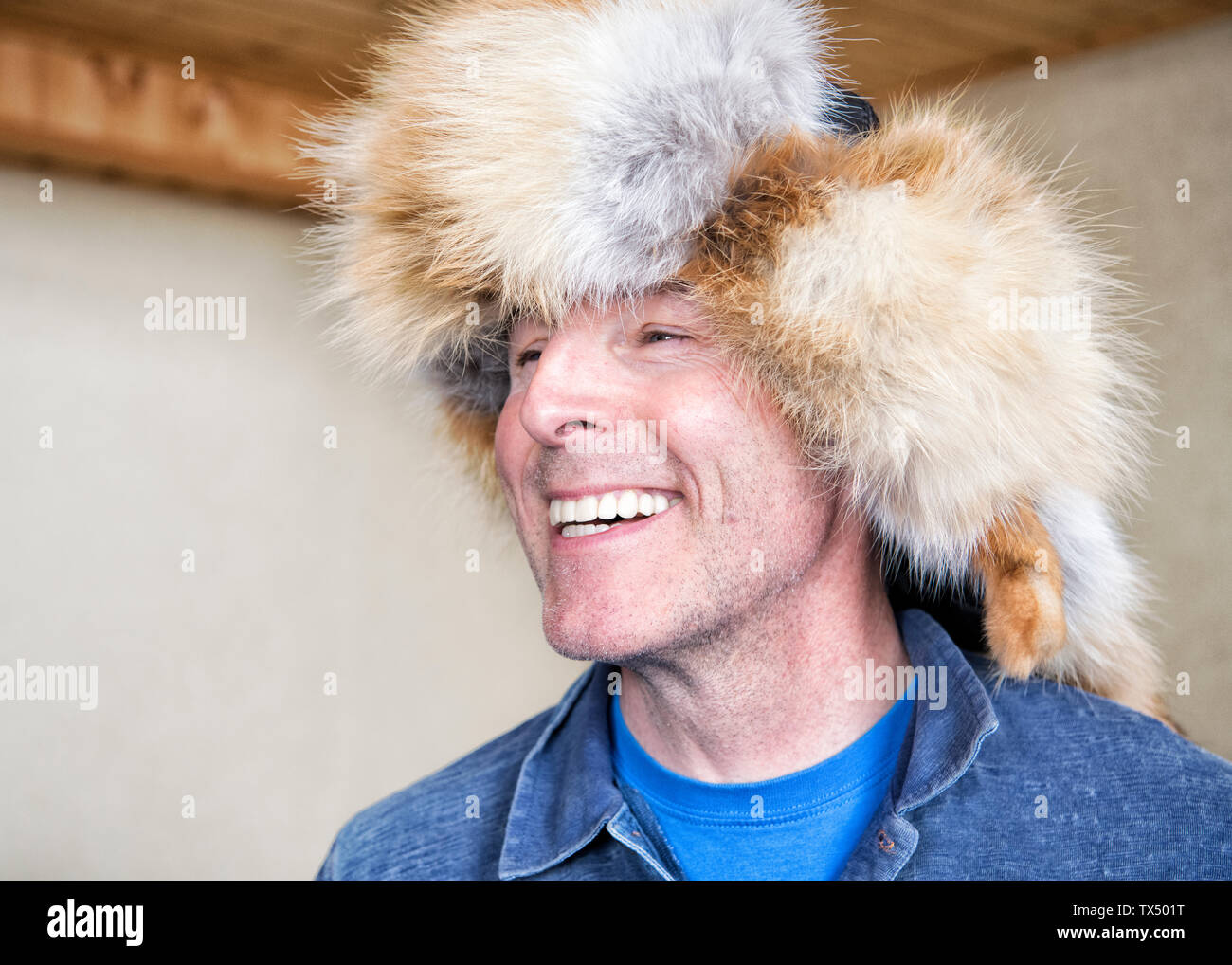 Portrait of laughing man wearing traditional Georgian fur hat Stock Photo