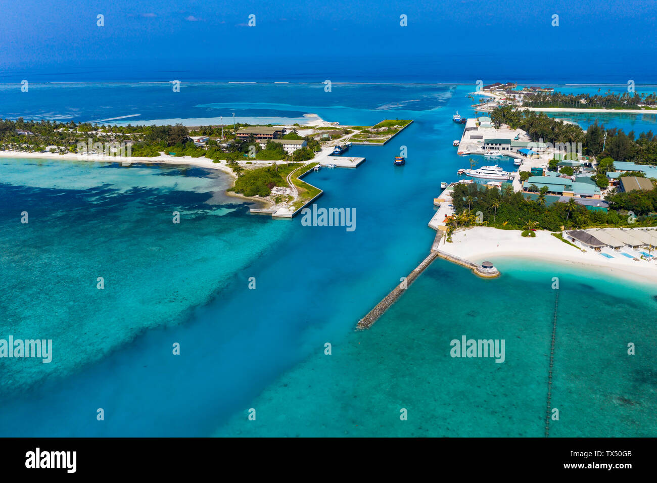 Maledives, South Male Atoll, canal between Olhuveli and Bodufinolhu, aerial view Stock Photo
