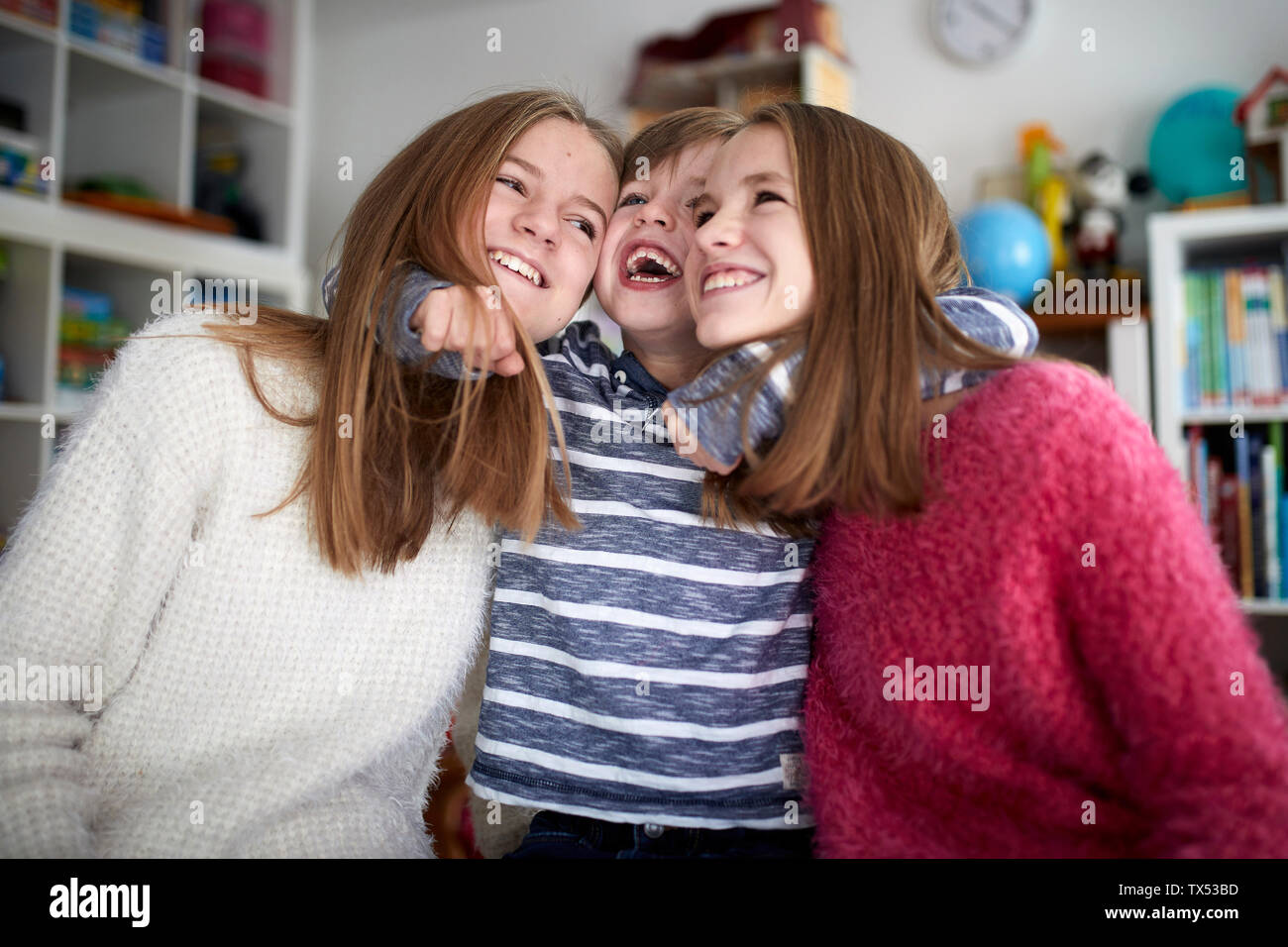 Siblings having fun together Stock Photo