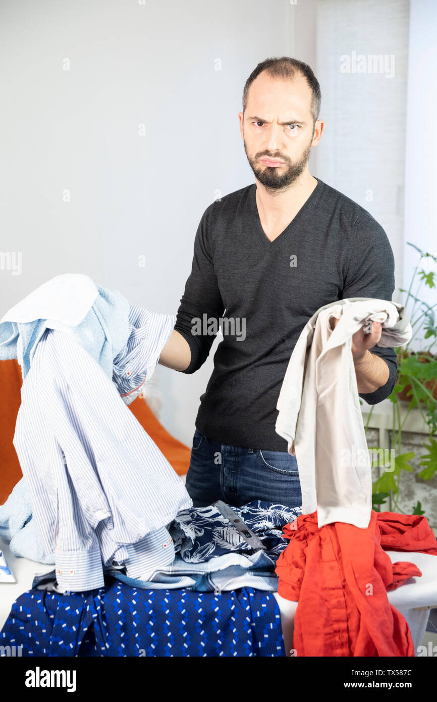 A man ironing Stock Photo