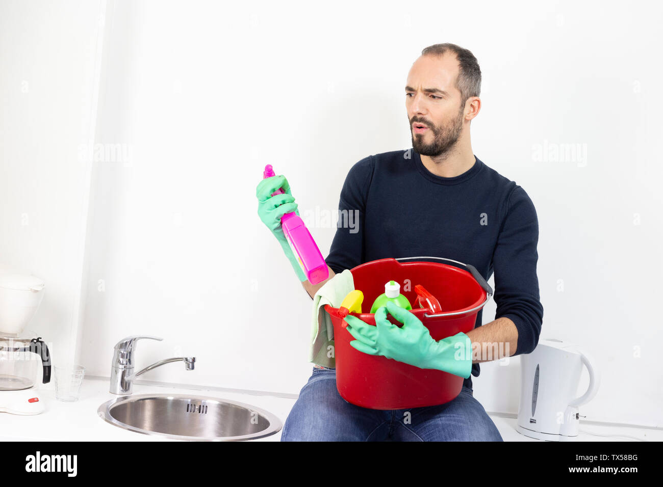 A man with cleaning products. Stock Photo