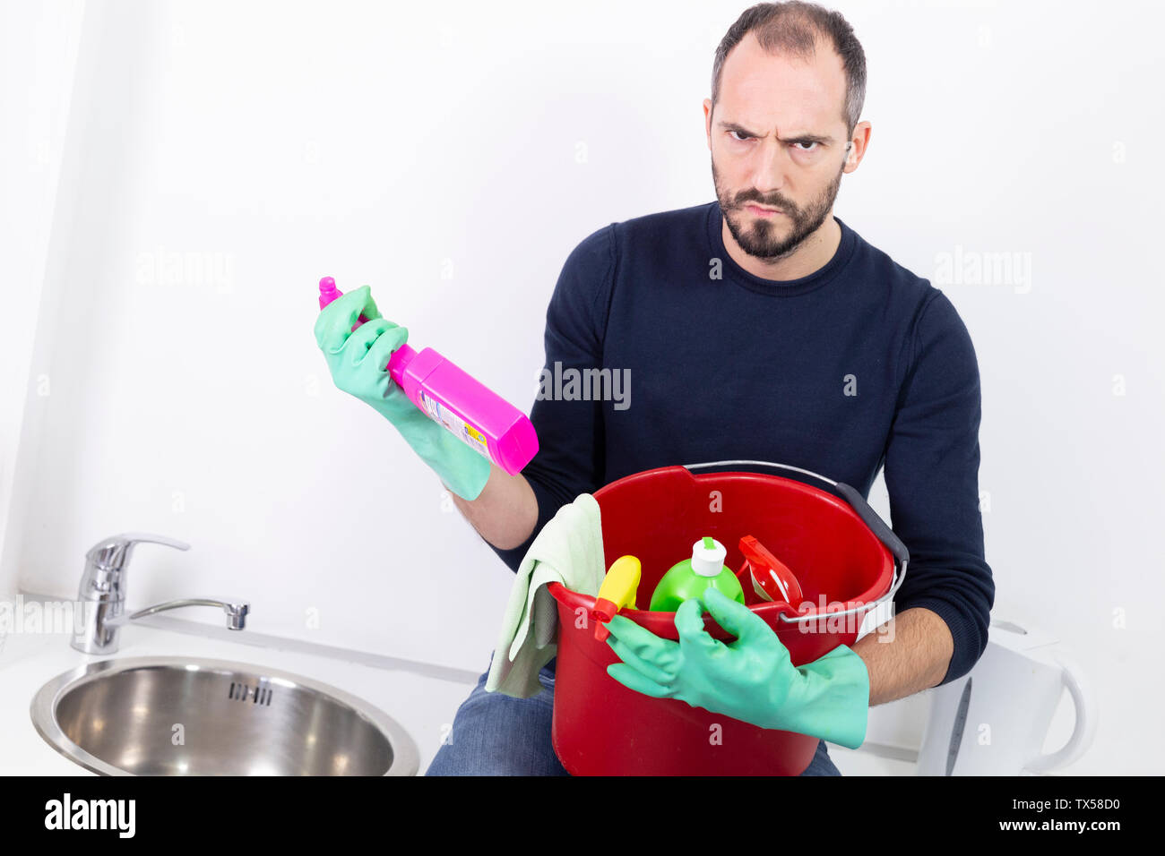 A man with cleaning products. Stock Photo