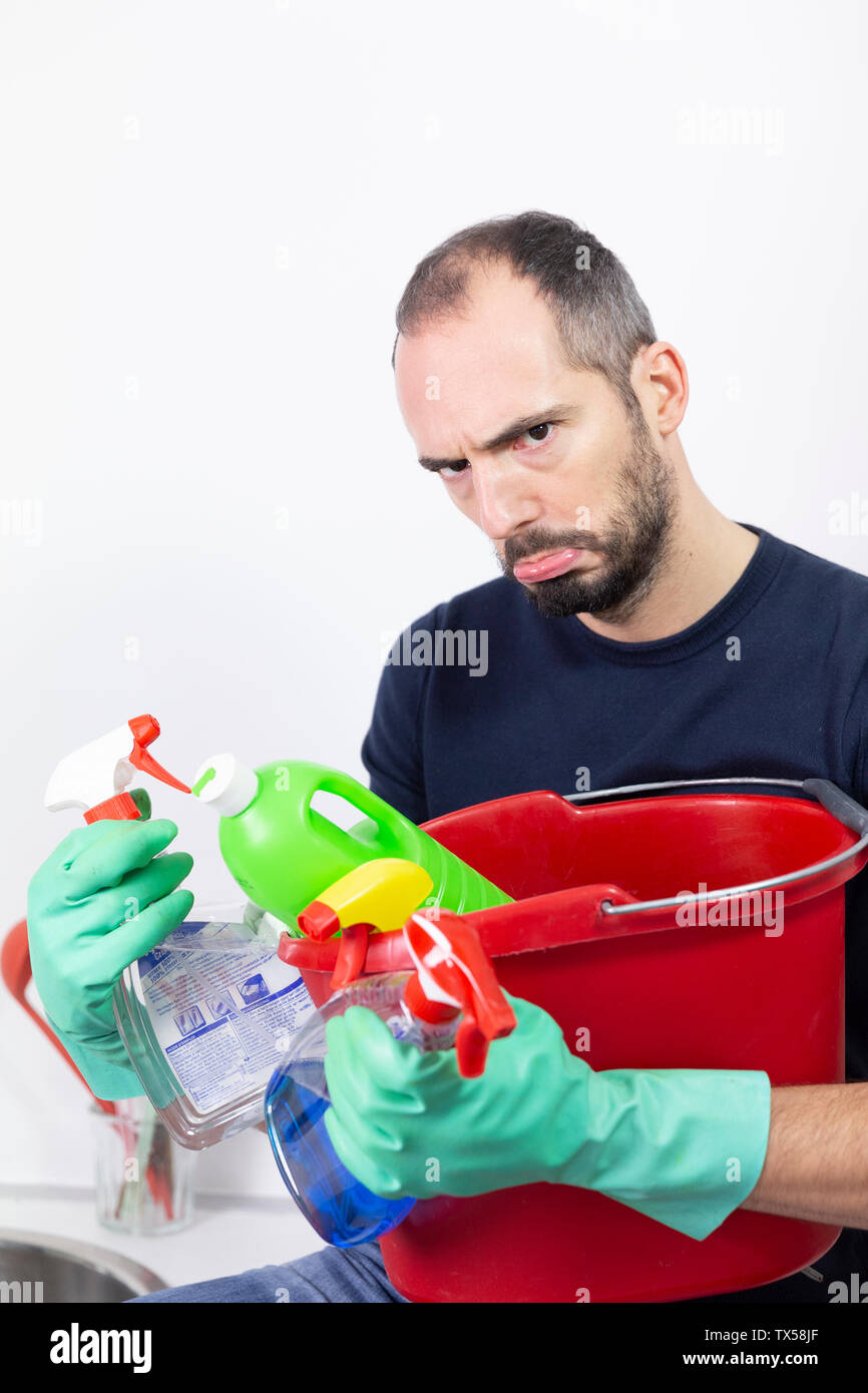 A man with cleaning products. Stock Photo