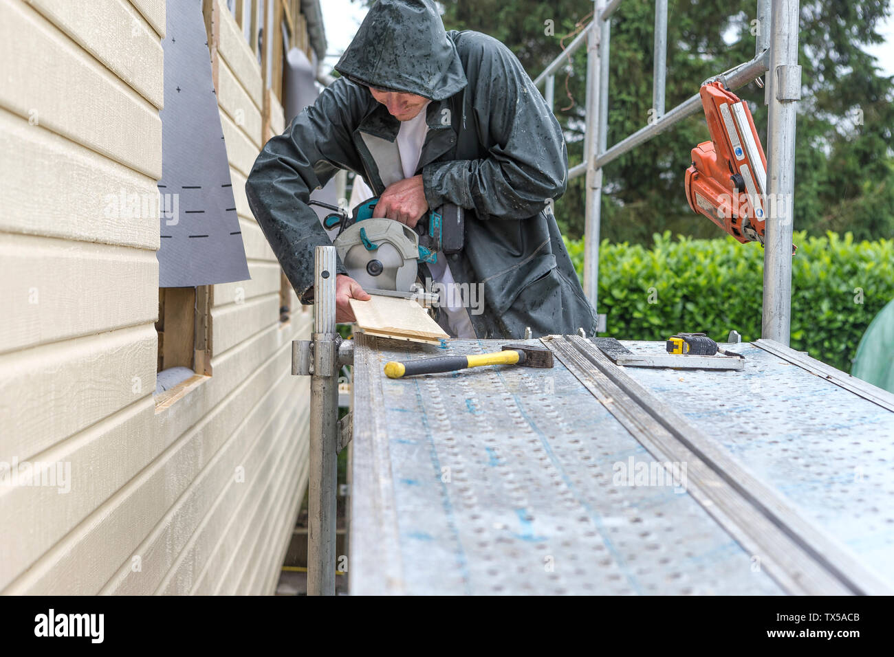 House insulation. scaffolding,mineral wool, composite panels timber