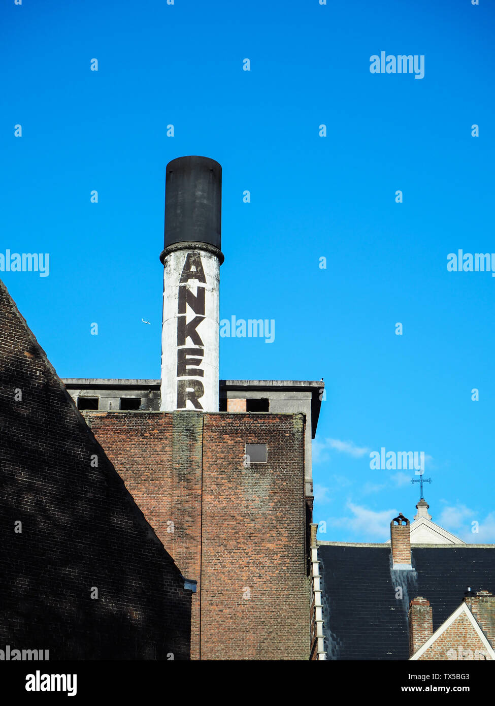 October 2018 - Mechelen, Belgium: Old chimney of the beer brewery Het Anker, producer of the beer Golden Carolus Stock Photo