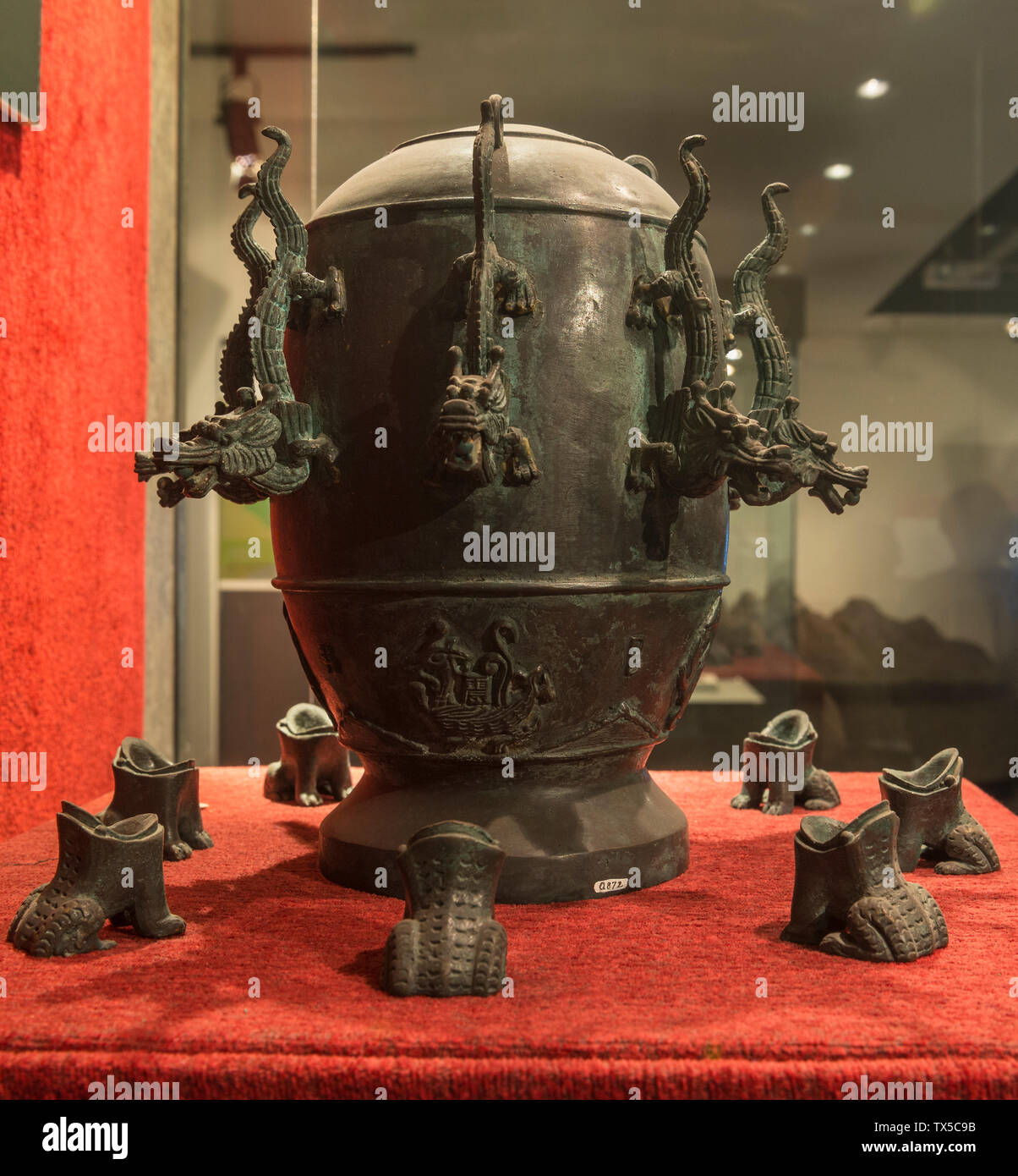 Dwindled duplicate of seismoscope or Di Dong Yi(Earth Motion Instrument) invented by Chinese inventor Zhang Heng (AD78-139).Geological Museum of China. Stock Photo