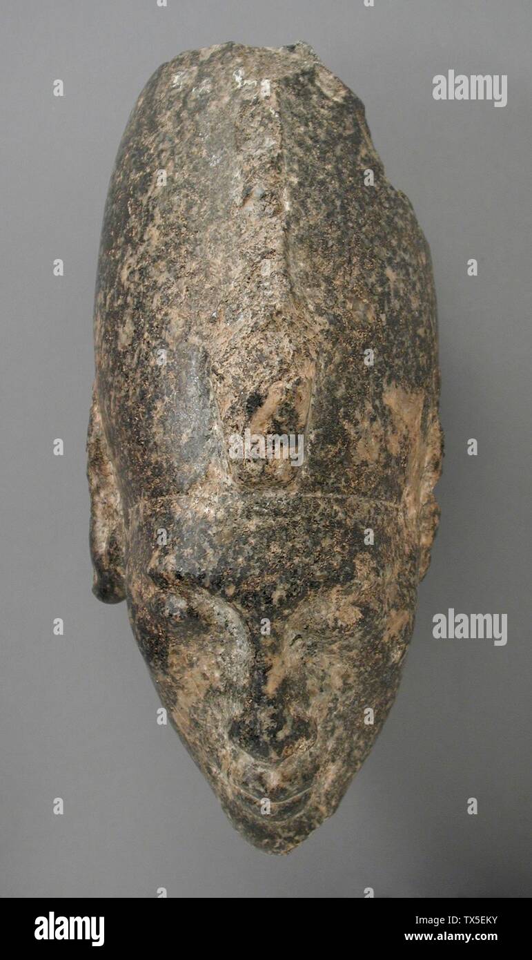 Head of a King Wearing the White Crown (image 2 of 2); Egypt, New Kingdom, Dynasty 18, reign of Akhenaten (1372 - 1355 BCE)  Sculpture Granite 7 1/2 x 3 1/8 in. (19 x 8 cm) Gift of Robert Miller and Marilyn Miller Deluca (M.80.199.18) Egyptian Art; Stock Photo