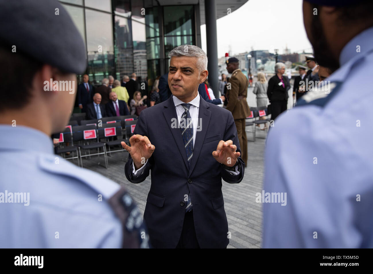 Mayor of London Sadiq Khan speaks during a flag-raising ceremony at City Hall, London, to show support for the men and women who make up the Armed Forces community ahead of Armed Forces Day. Stock Photo