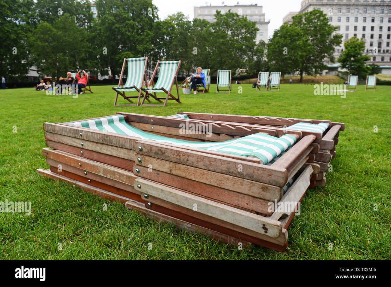 Collapsed deckchairs in Green Park, London, on what is expected to be