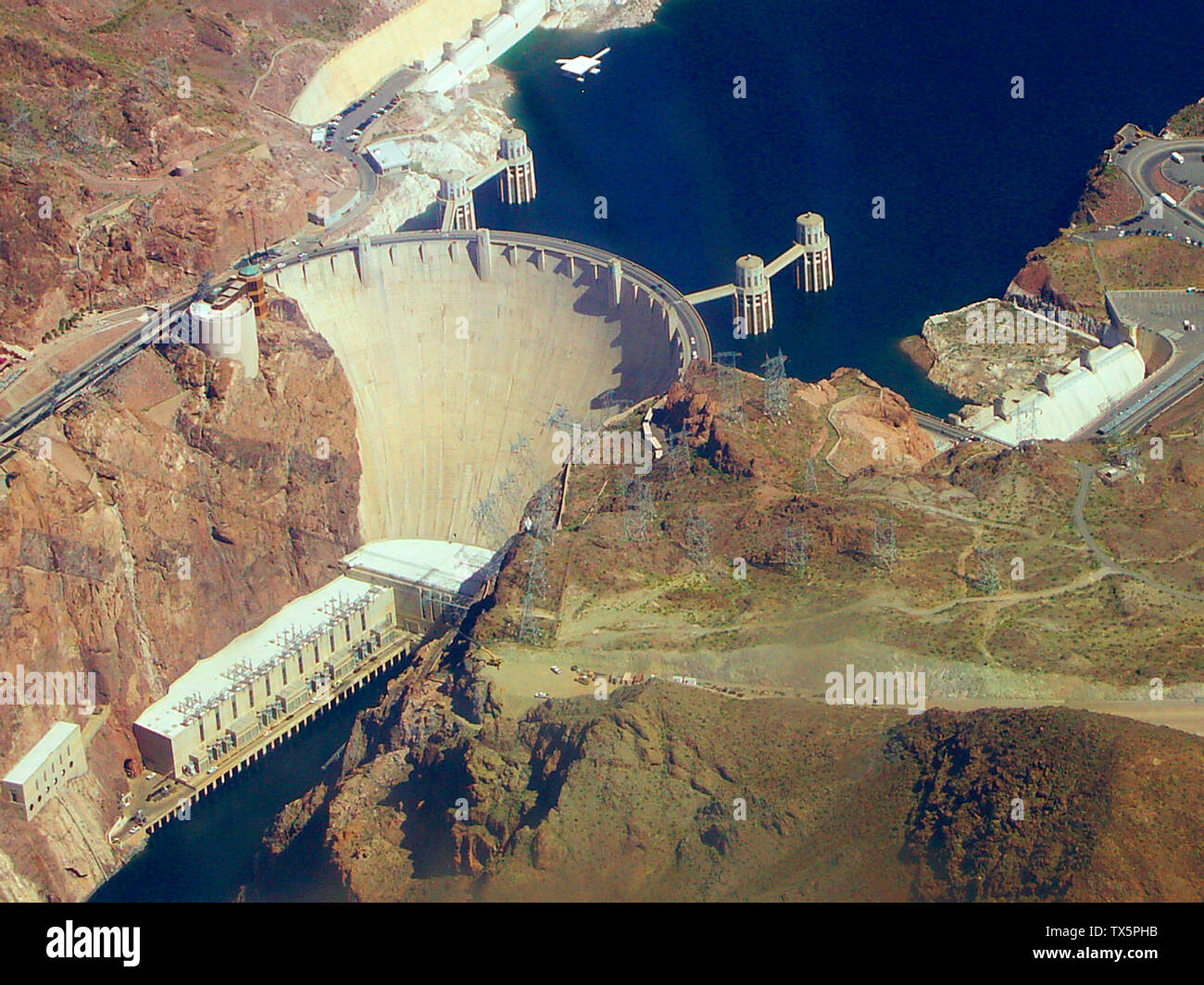 Hoover dam from plane, color balance corrected and gamma and contrast changes to restore original appearance of scene looks like coolgardie; March 2005, edited January 26, 2007; en.pedia; LICKO; Stock Photo