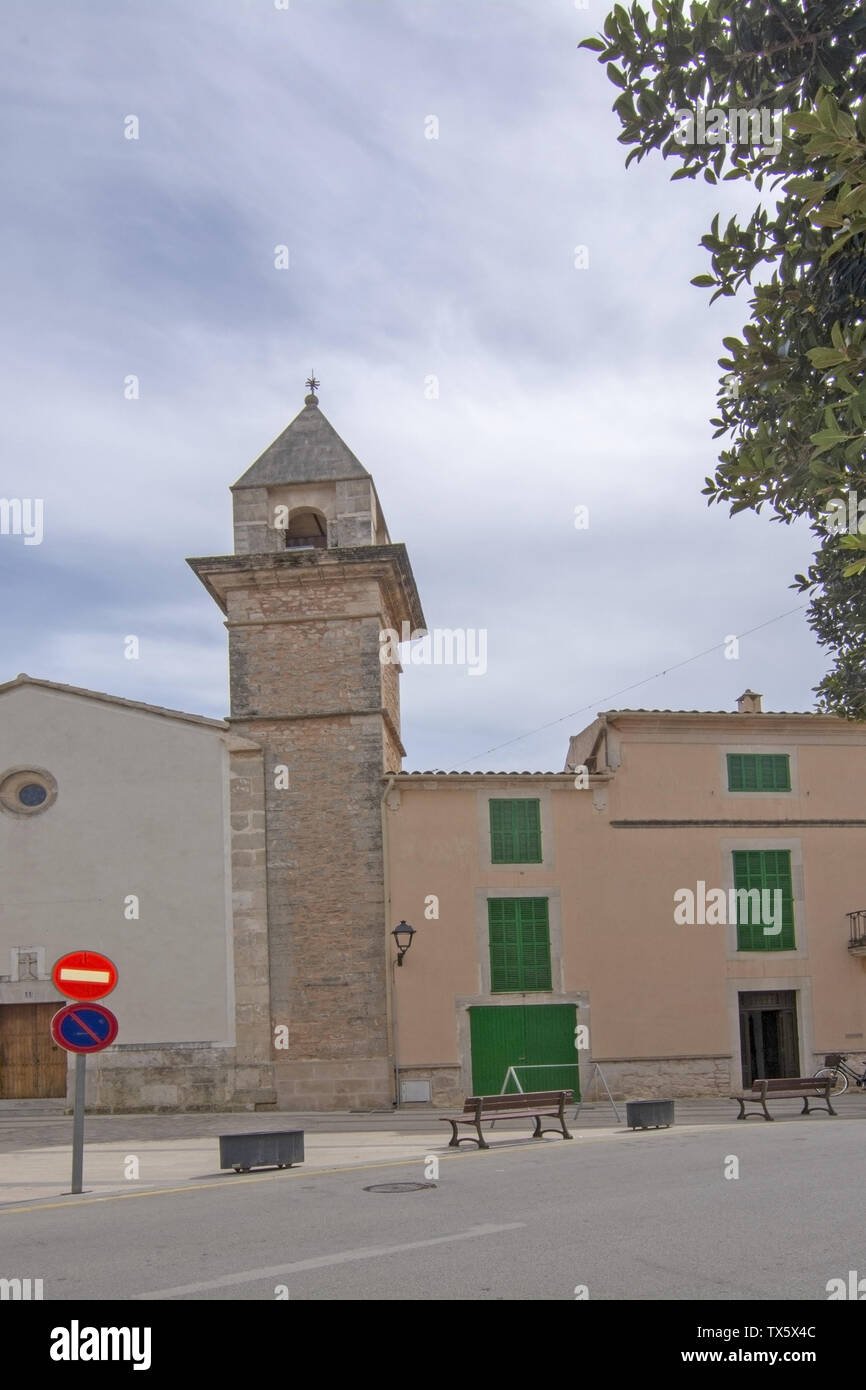 SES SALINES, MALLORCA, SPAIN - APRIL 15, 2019: Street view in central village on an overcast day in the beginning of tourist season. Stock Photo