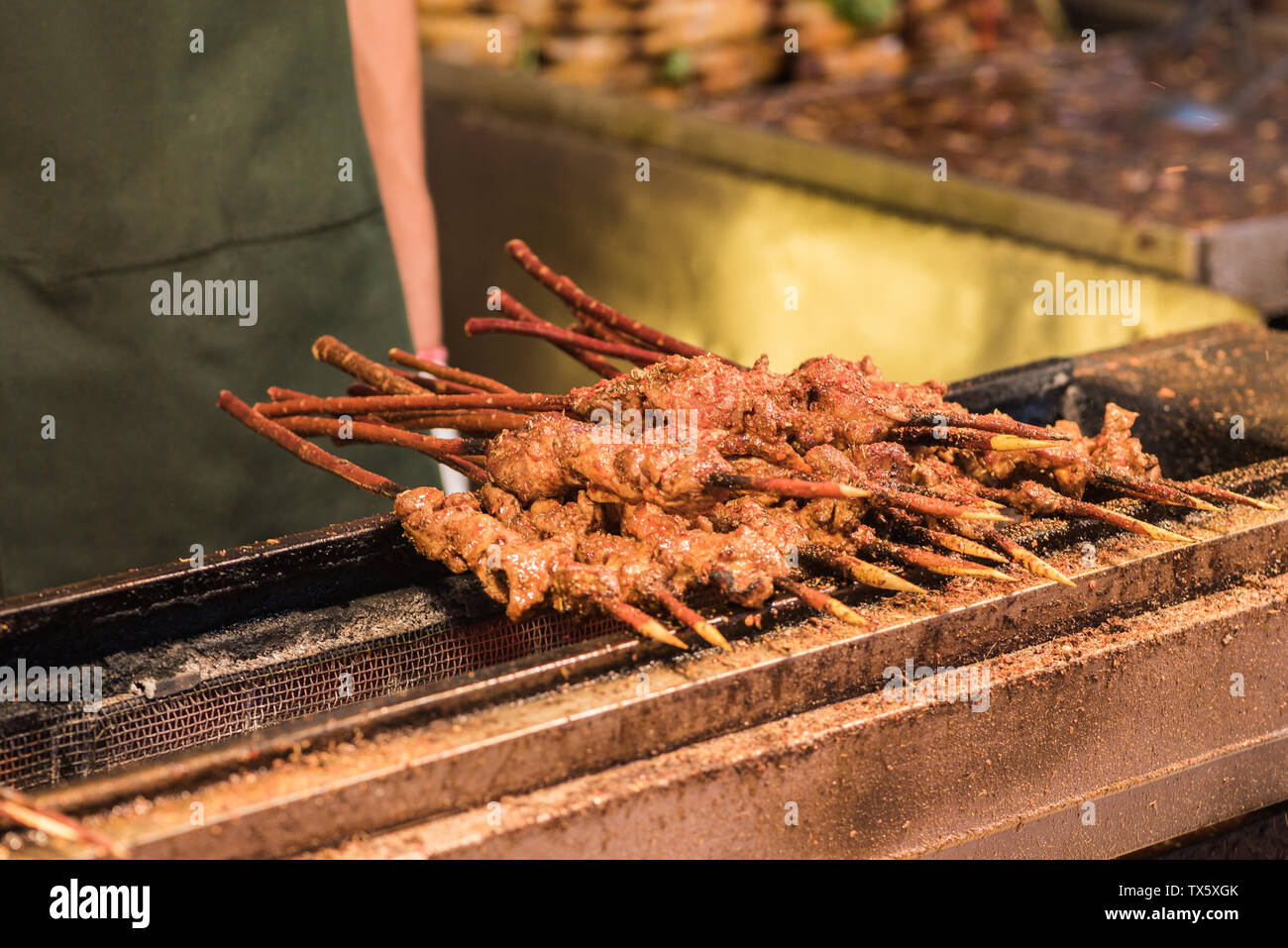Delicious barbecue lamb kebab on the roadside stall at the night market in Huimin Street Scenic Area, Xi'an Stock Photo