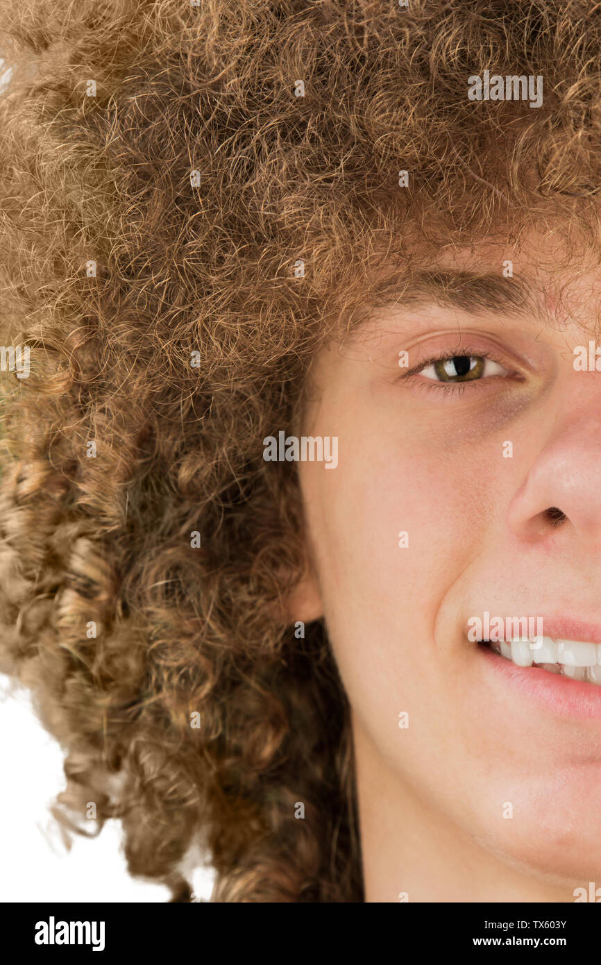 split in half cropped portrait of a young curly European man with long curly hair and a dreamy smile close-up. very lush male hair. curling hair men's Stock Photo - Alamy split in half cropped portrait of a young curly European man with long curly hair and a dreamy smile close-up. very lush male hair. curling hair men's Stock Photo - Alamy