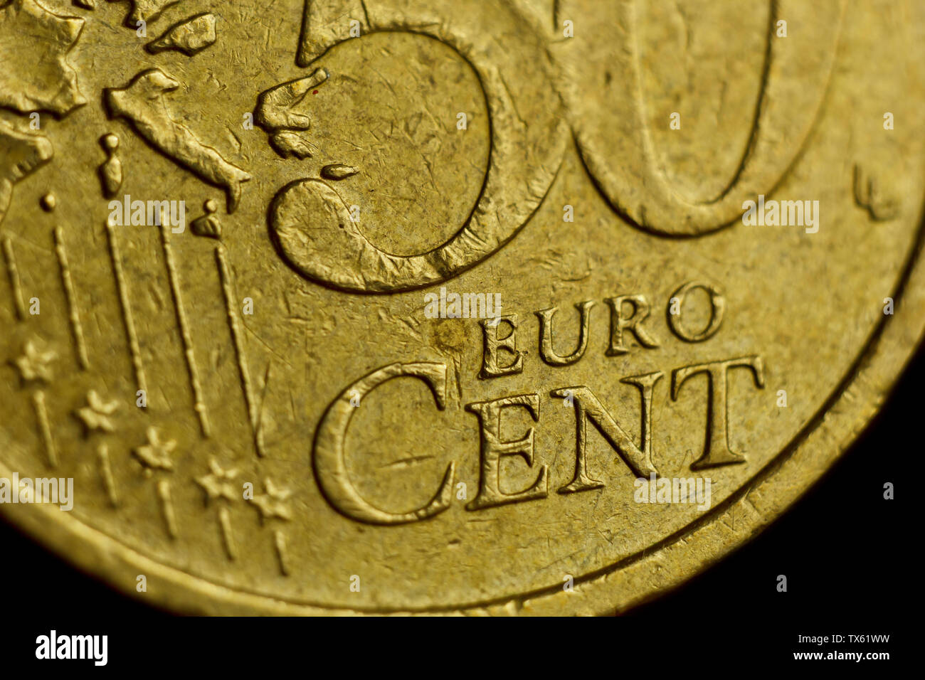 Coin Fifty Eurocent Macro Isolated On Black Background. Detail of metallic money close up. EU money. Stock Photo