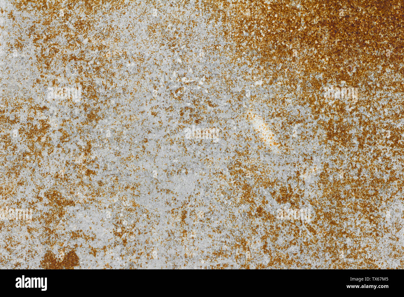 rusty background, texture of old metal sheet covered with rust Stock Photo