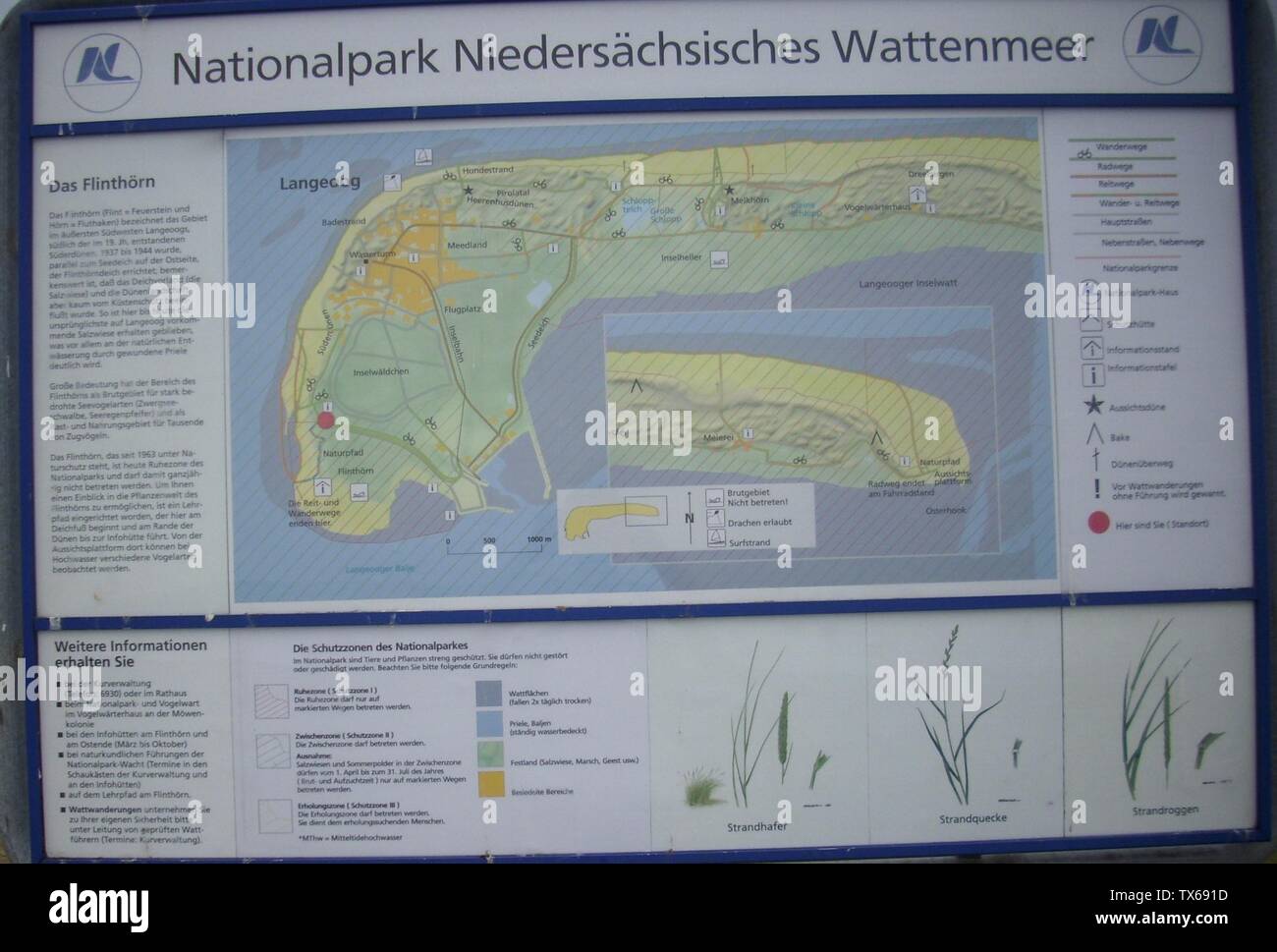 Infotafel am Naturpfad FlinthÃ¶rn auf Langeoog; auf der abgebildeten Karte sind die Bereiche von Langeoog erkennbar, die im Nationalpark NiedersÃ¤chsisches Wattenmeer liegen.; Taken onÂ 14 June 2010; Self-photographed; C.Mezzo-1; Stock Photo