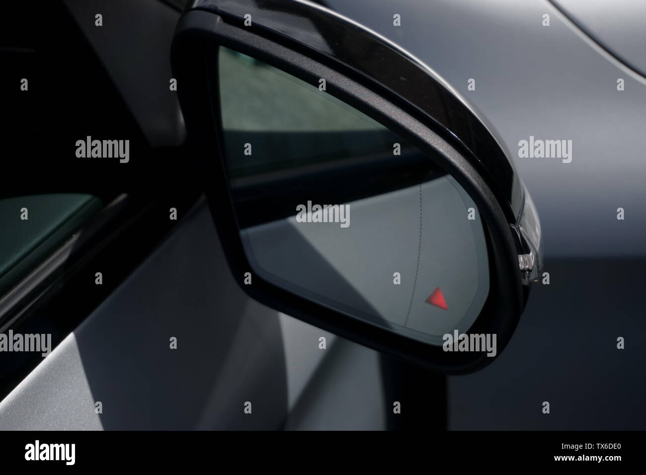 Car door mirror with lane departure warning Stock Photo Alamy
