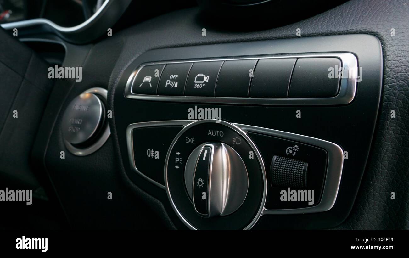 Light controls and buttons for technology features in a car Stock Photo