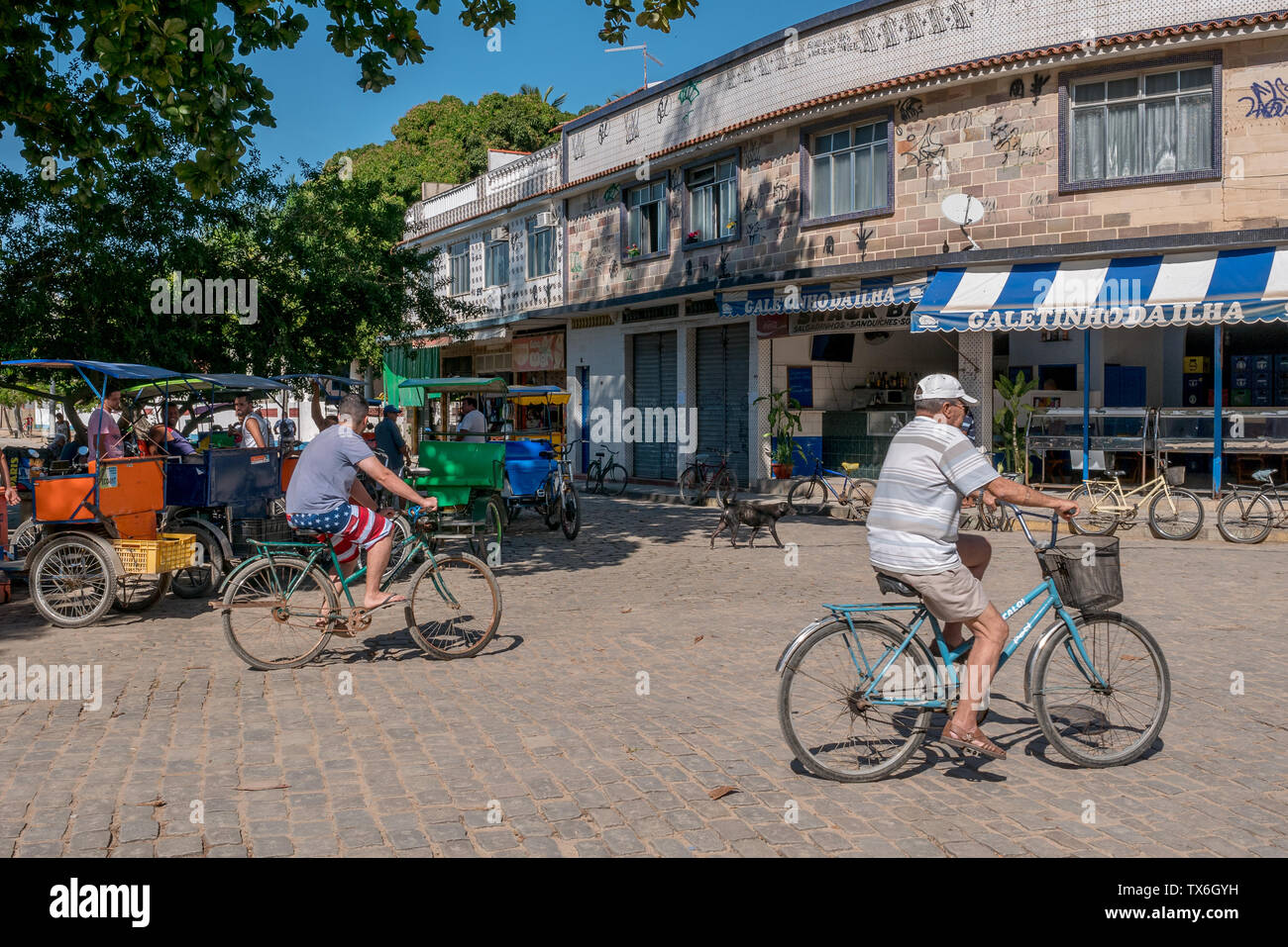 Rio de Janeiro, Brazil - June 22, 2019: the main square of Paqueta Island with people and bycicles on the street. Stock Photo