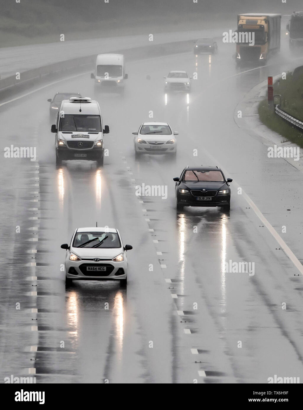 Torrential rain on the A1 near Leeming in Yorkshire on what is expected to be the hottest day of the year, as thunderstorms could bring a month's worth of rain to parts of the UK, before the hottest temperatures of the year so far bring a balmy end to June. Stock Photo