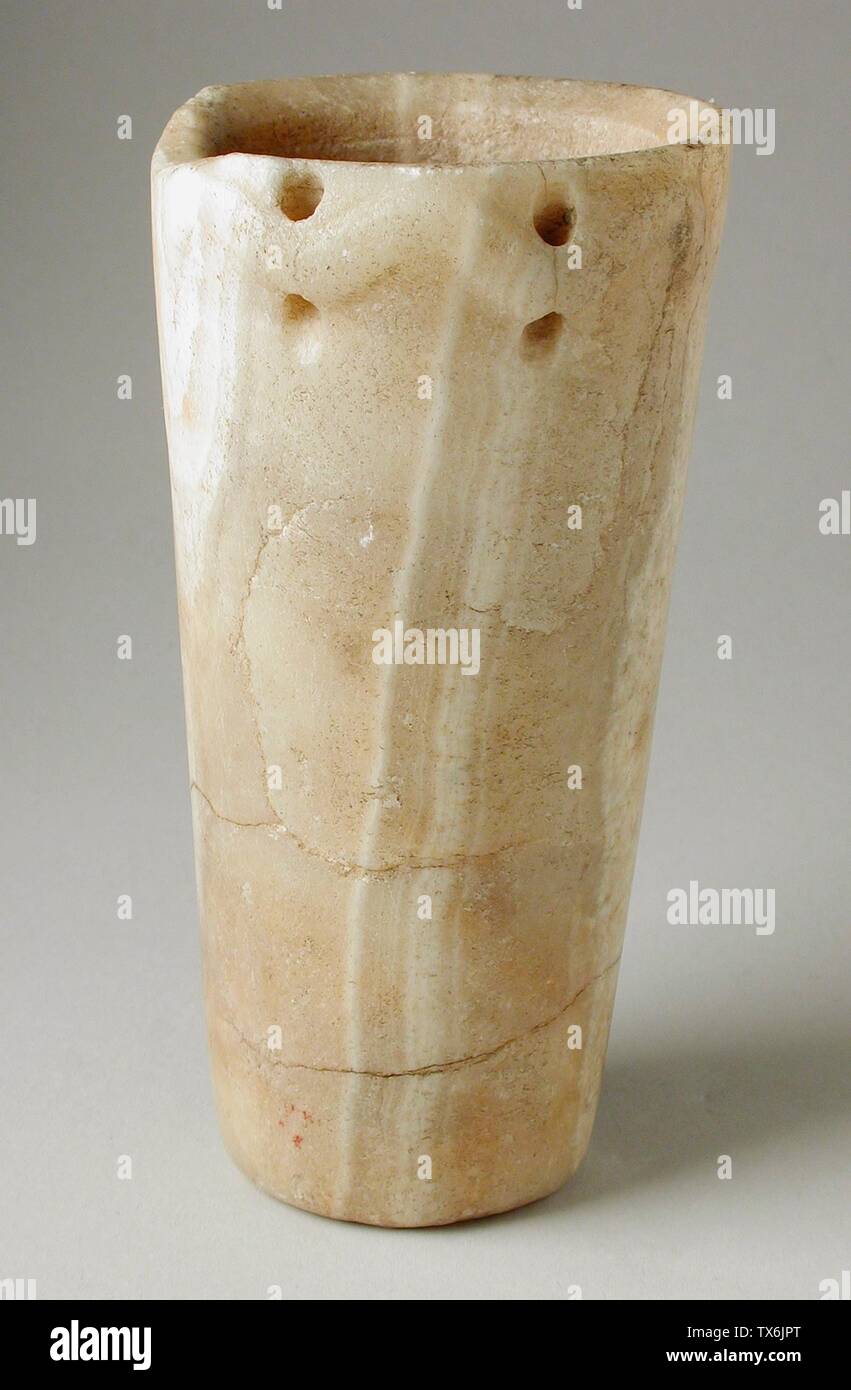 Jar; Egypt, Pre-dynastic Period - early Dynastic Period (5500 - 2687 BCE) Furnishings; Serviceware Carved and drilled calcite 5 7/16 x 3 1/16 in. (13.8 x  7.7 cm) Gift of Carl W. Thomas (M.80.203.3) Egyptian Art; Pre-dynastic Period - early Dynastic Period (5500 - 2687 BCE); Stock Photo