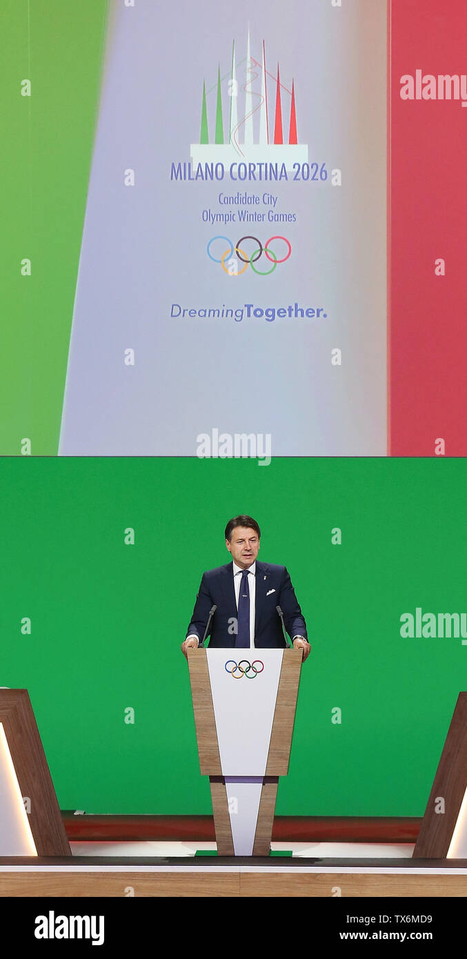 Lausanne, Switzerland. 24th June, 2019. Italian Prime Minister Giuseppe Conte speaks during the final presentation of Milan-Cortina d'Ampezzo of Italy to bid for the 2026 Olympic Winter Games during the 134th session of International Olympic Committee (IOC) in Lausanne, Switzerland, June 24, 2019. Credit: Cao Can/Xinhua/Alamy Live News Stock Photo