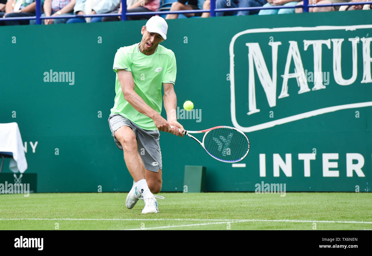 Eastbourne, UK. 24th June, 2019. John Millman of Australia in action during his defeat to Fernando Verdasco of Spain in their match at the Nature Valley International tennis tournament held at Devonshire Park in Eastbourne . Credit: Simon Dack/Alamy Live News Stock Photo
