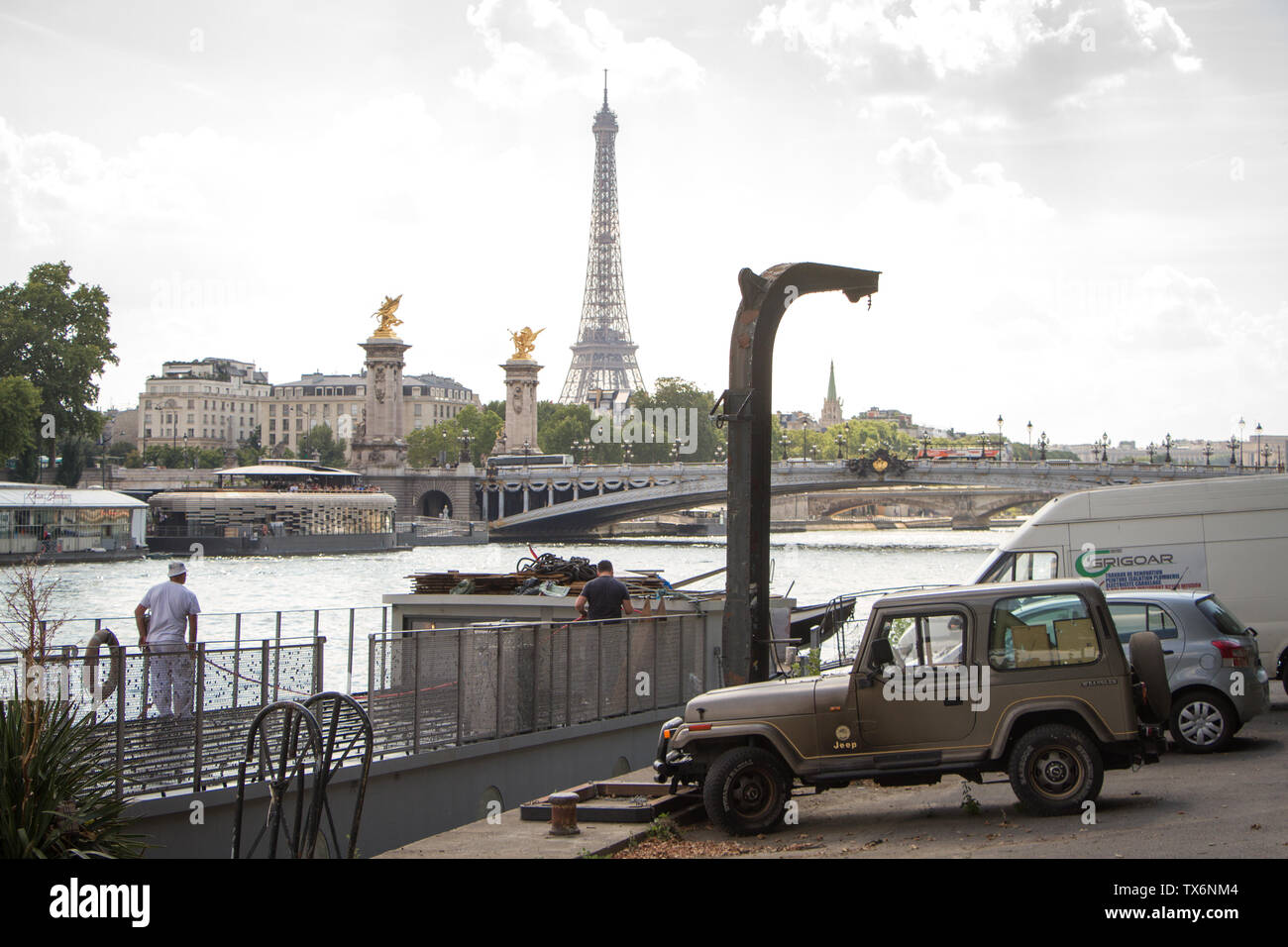 Paris, France July 06, 2018 Car parking, barge and Alexander the Third Bridge on the