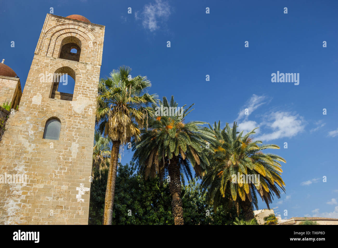 Palermo Sicily famous arabic bell tower of church San Giovanni degli Eremiti, historical heritage with bell tower and palms Stock Photo