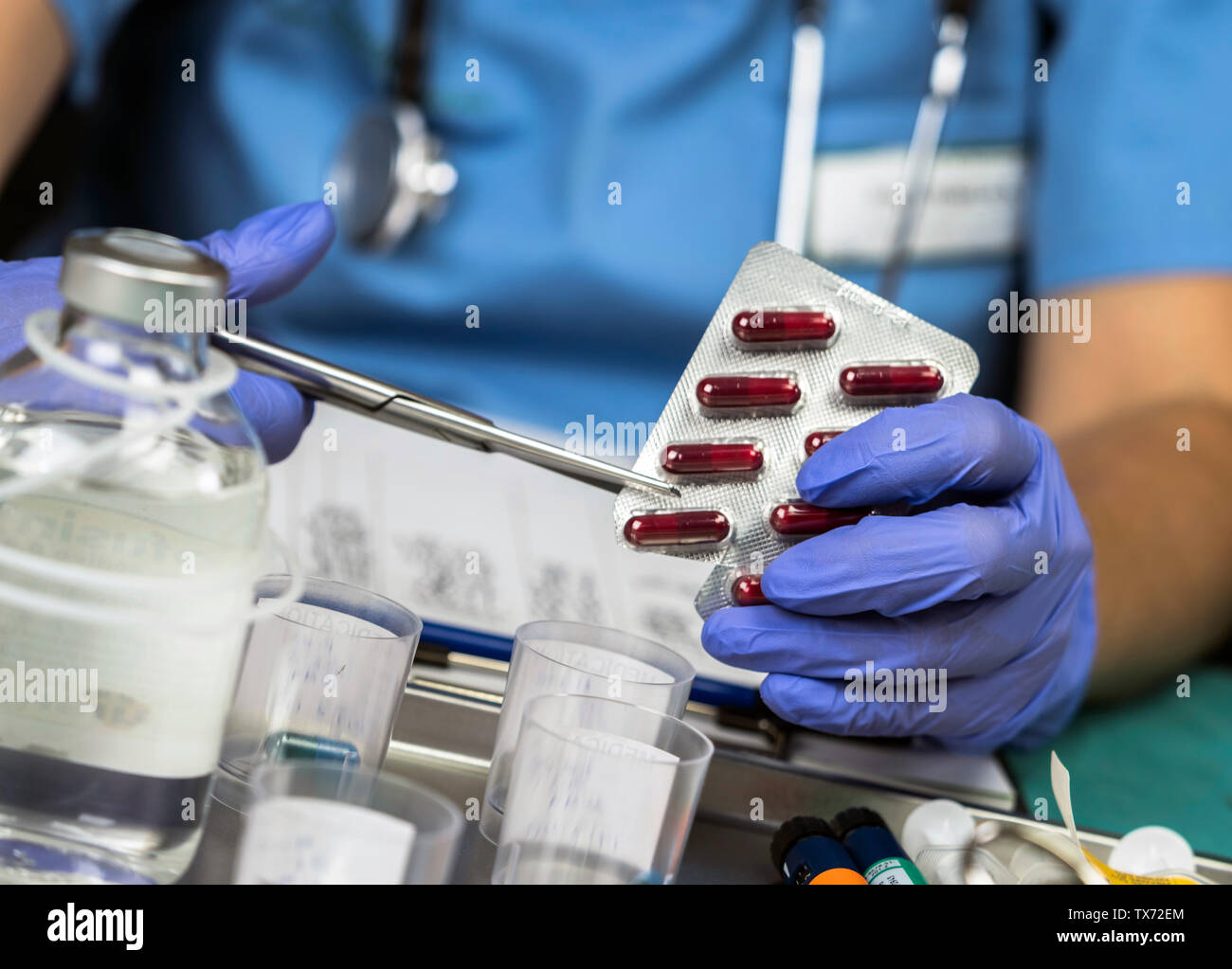 Monodose medication pills with scissors, conceptual image Stock Photo ...
