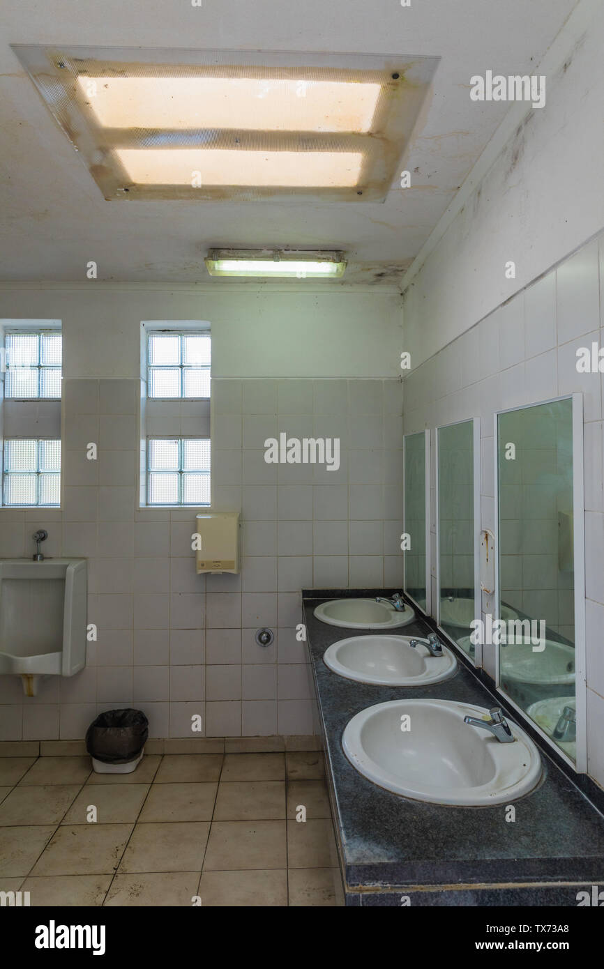 Interior of a dirty spanish bathroom Stock Photo Alamy