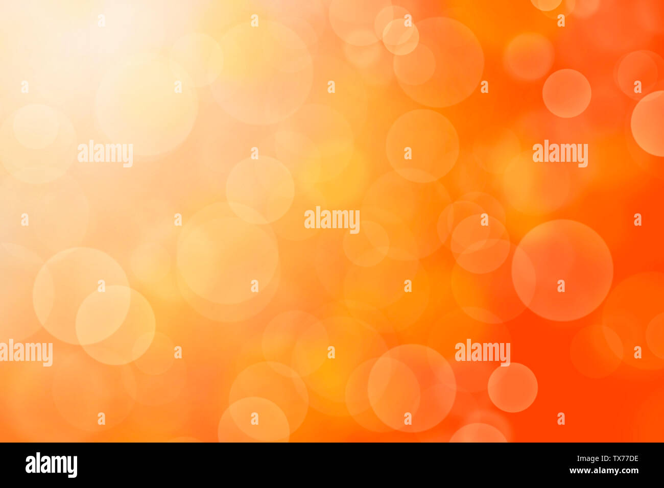 Orange abstract background blur with bokeh light effect Stock Photo