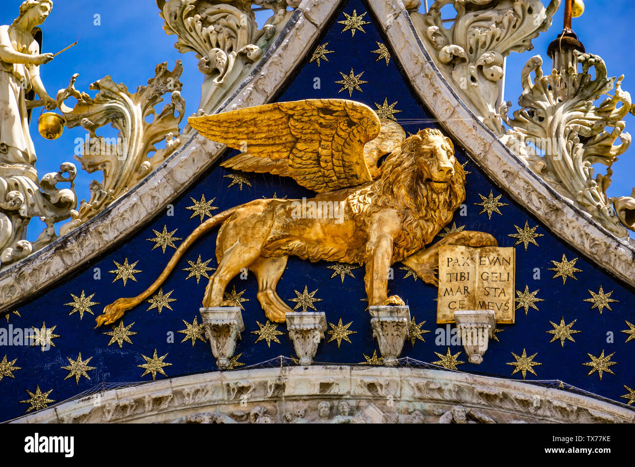 View at Lion of St Mark, symbol of imperial Venice on the Basilica San Marco in Italy Stock Photo