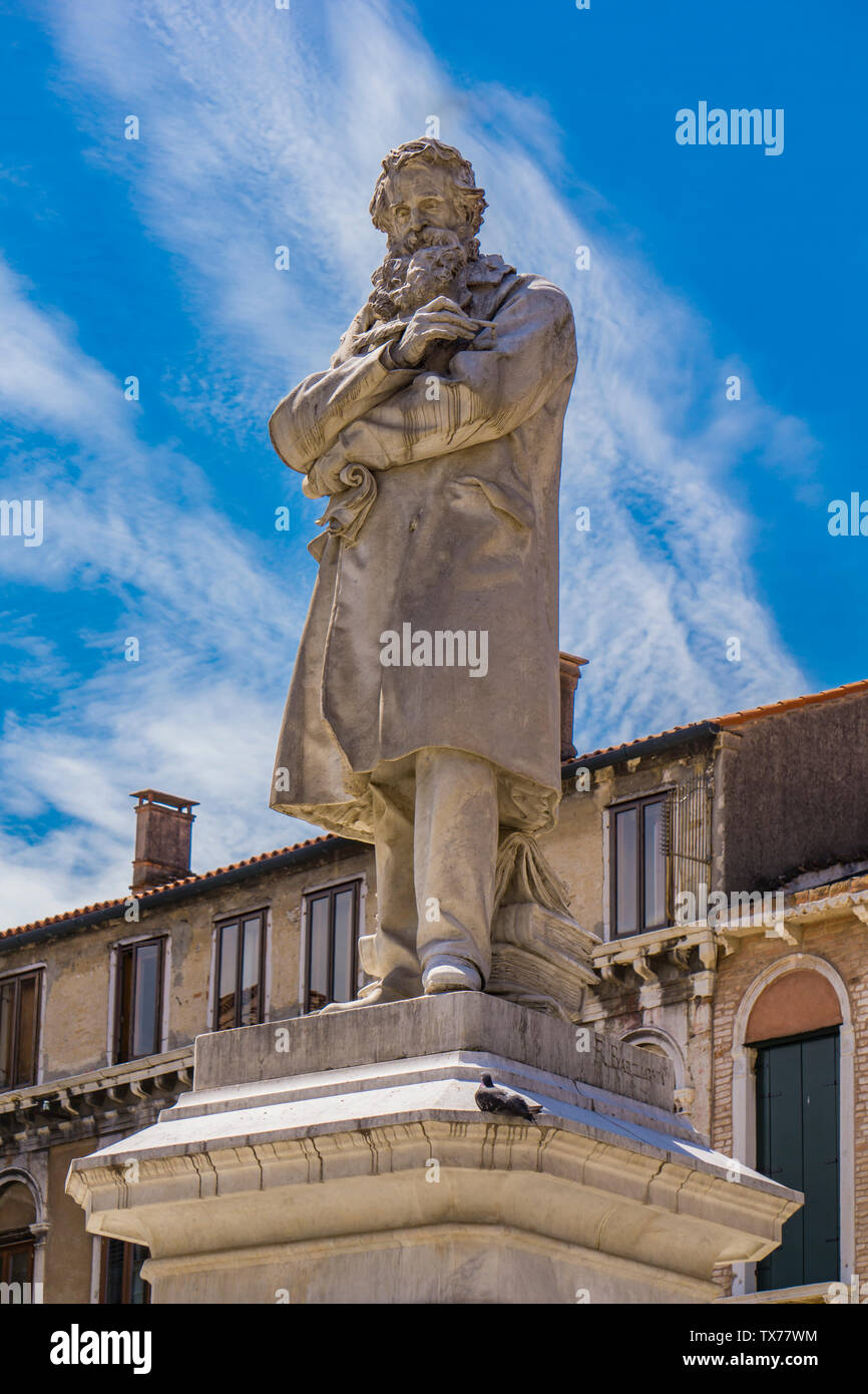 Monument to Italian linguist Niccolo Tommaseo in Venice, Italy by Francesco Barzaghi at 1882 Stock Photo