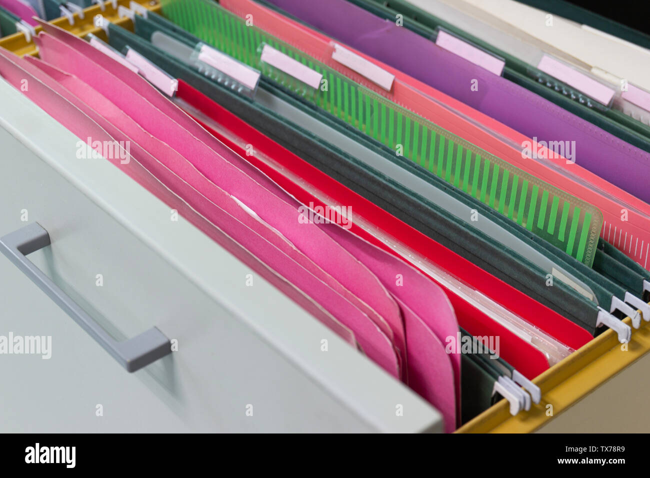 Files document of hanging file folders in a drawer in a whole pile of full papers, at work office, Business Concept Office document storage Stock Photo