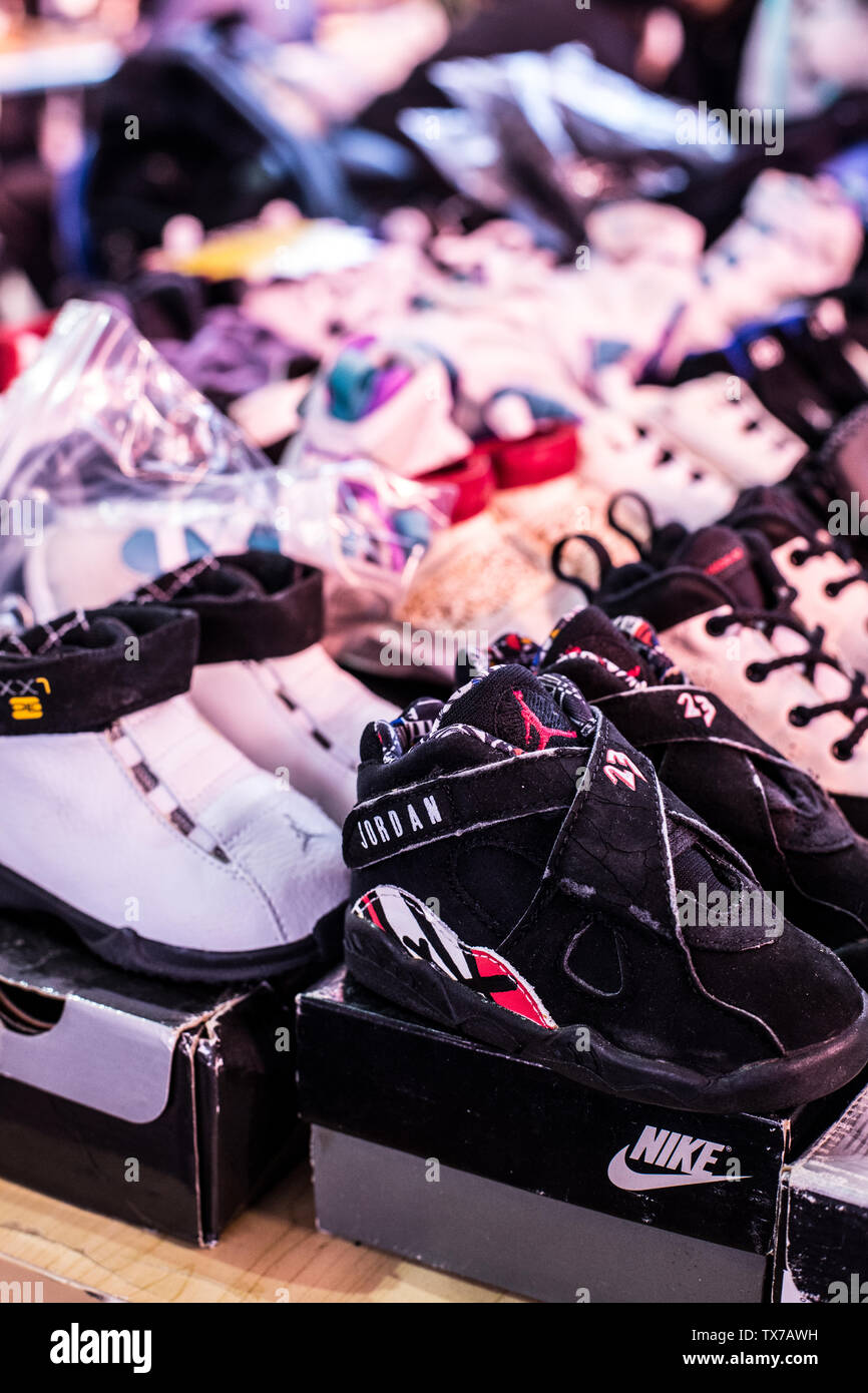 Children's sneakers at the shoe show. Stock Photo