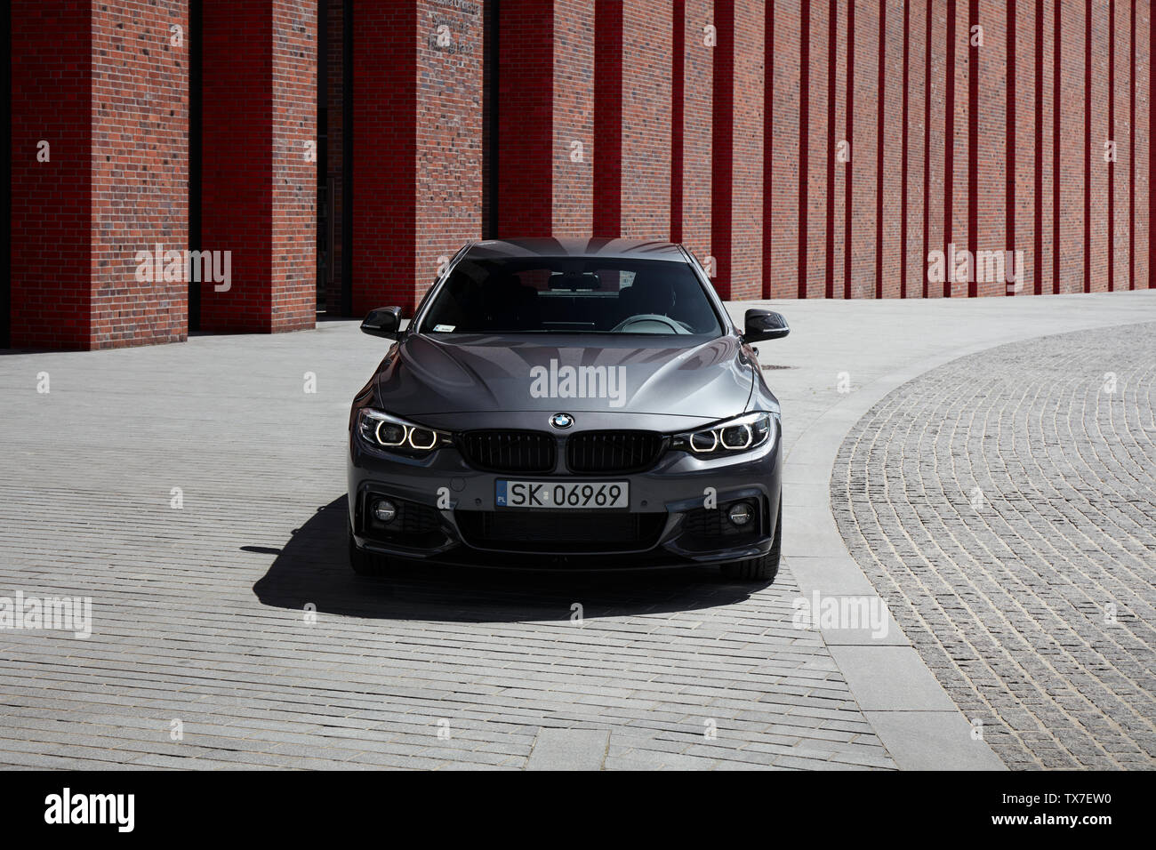 Katowice/Poland-06.30.2017: BMW 430i, 252 HP, standing in front of NOSPR building - one of the most modern concert halls in europe Stock Photo