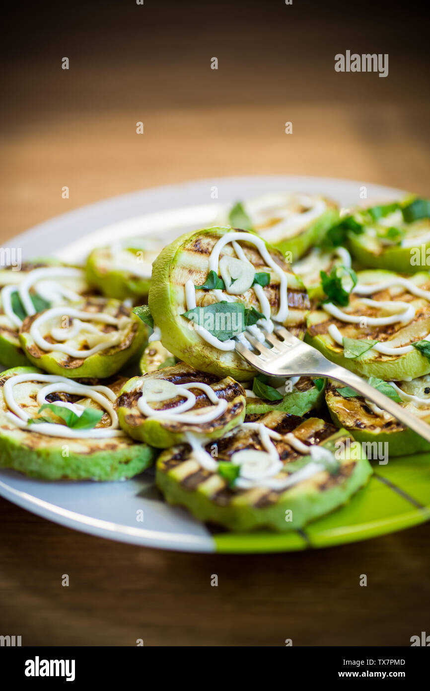 grilled zucchini slices with garlic and spices Stock Photo Alamy
