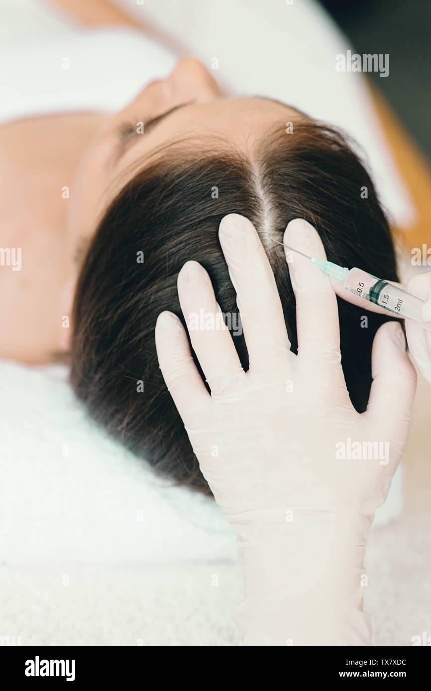 treatment of hair loss, injection for hair growth. Injected in woman's