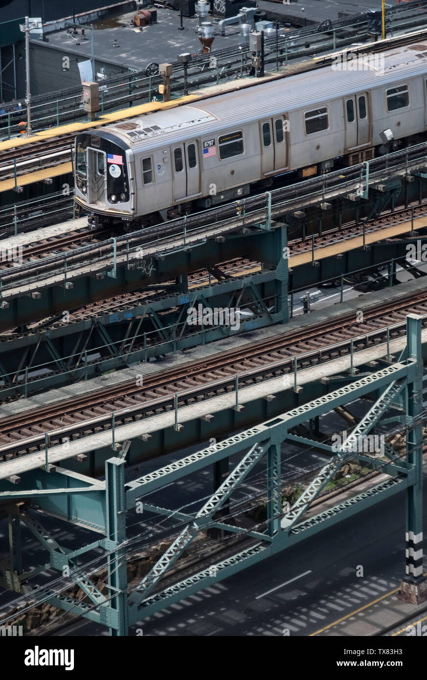 New York City Subway Train on elevated section of line, near Queensboro Plaza, Long Island City, New York, USA Stock Photo
